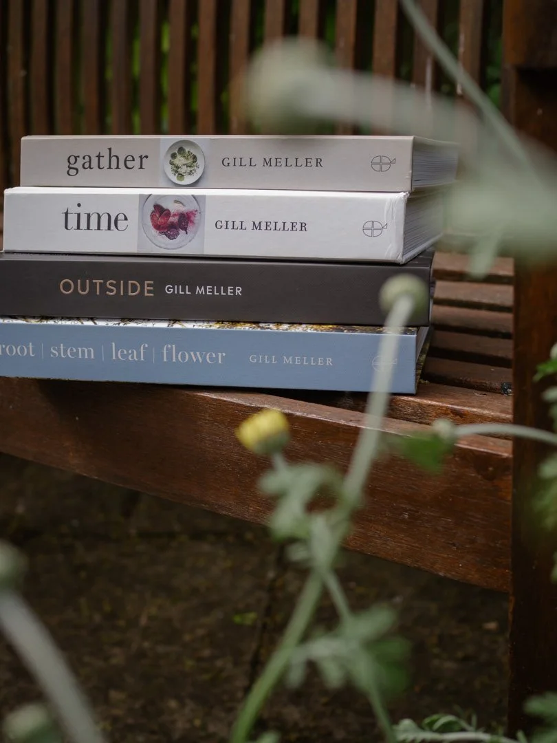 Four cookbooks by Gill Meller stacked together, celebrating slow, seasonal cooking and food storytelling.