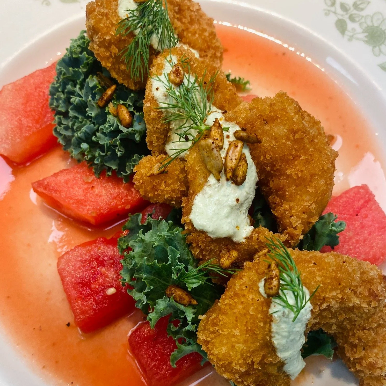 Crispy meets refreshing 🌾🍤 Our Fried Shrimp comes alive with watermelon aguachile, poblano &amp; pickle cream, kale, dill, and spiced sunflower seeds, a perfect bite of flavor and texture. #harvestmckinney  #farmtotablefood  #McKinneyEats