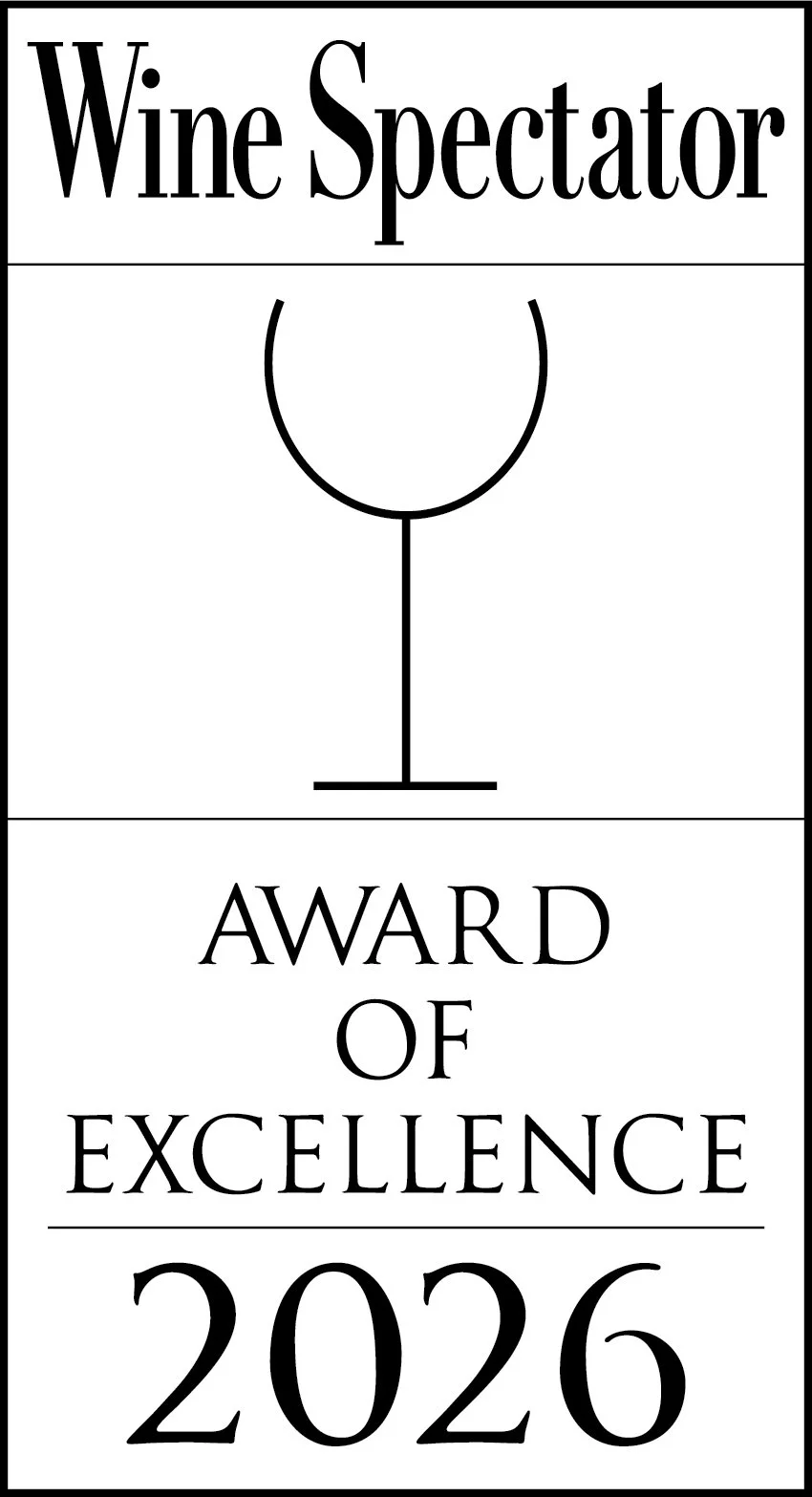 Design for a wine-related award with text 'Wine Spectator Award of Excellence 2026' and a graphic of a wine glass