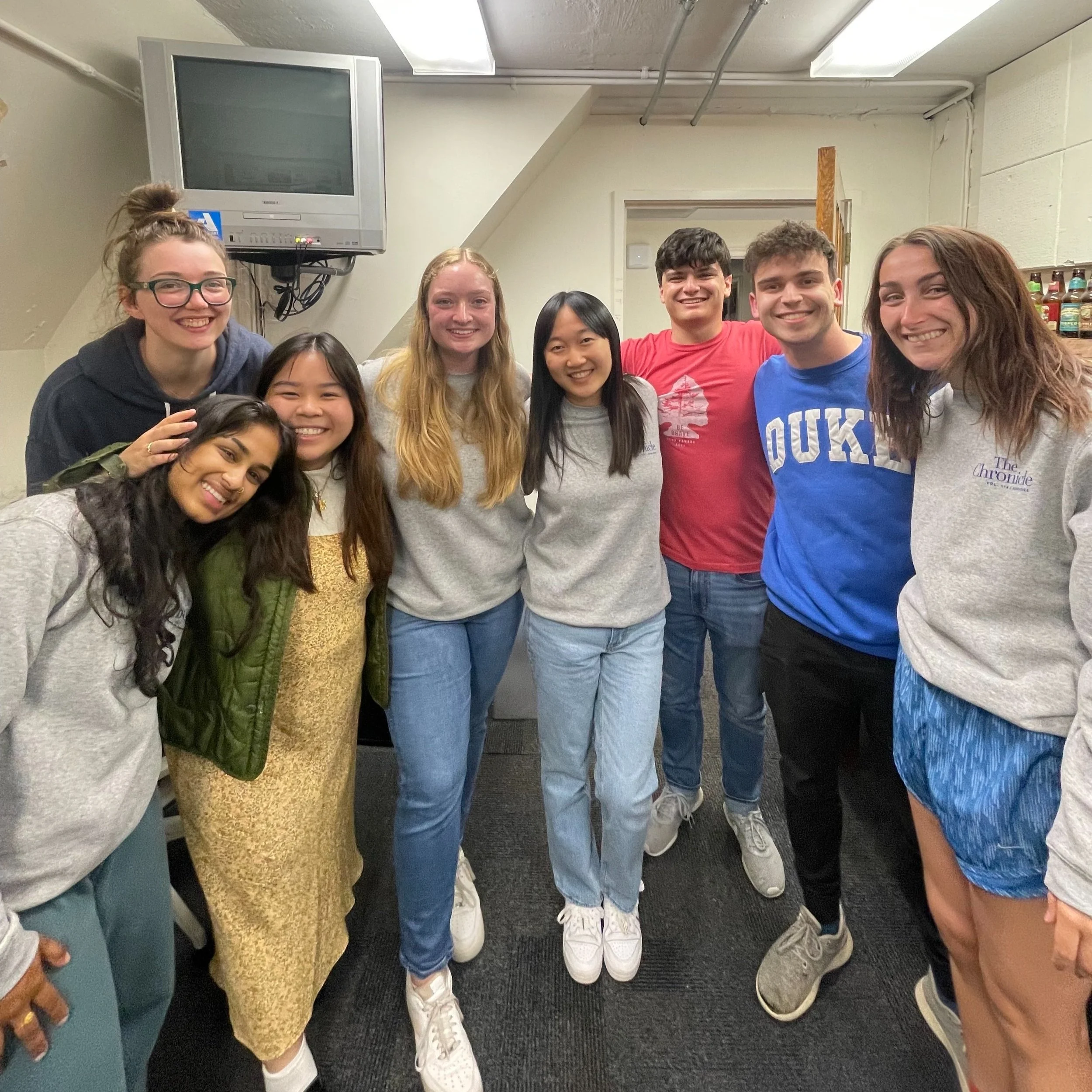Members of the Chronicle team posing in the Chronicle office.