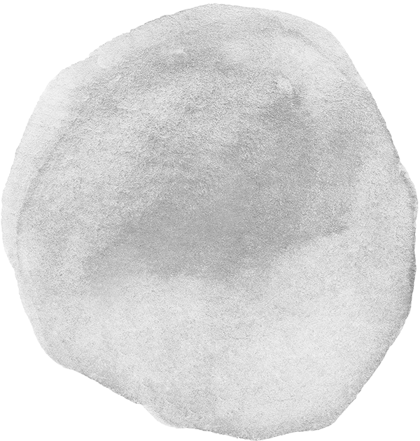 A round, gray, watercolor-style shape or object with soft, uneven shading.
