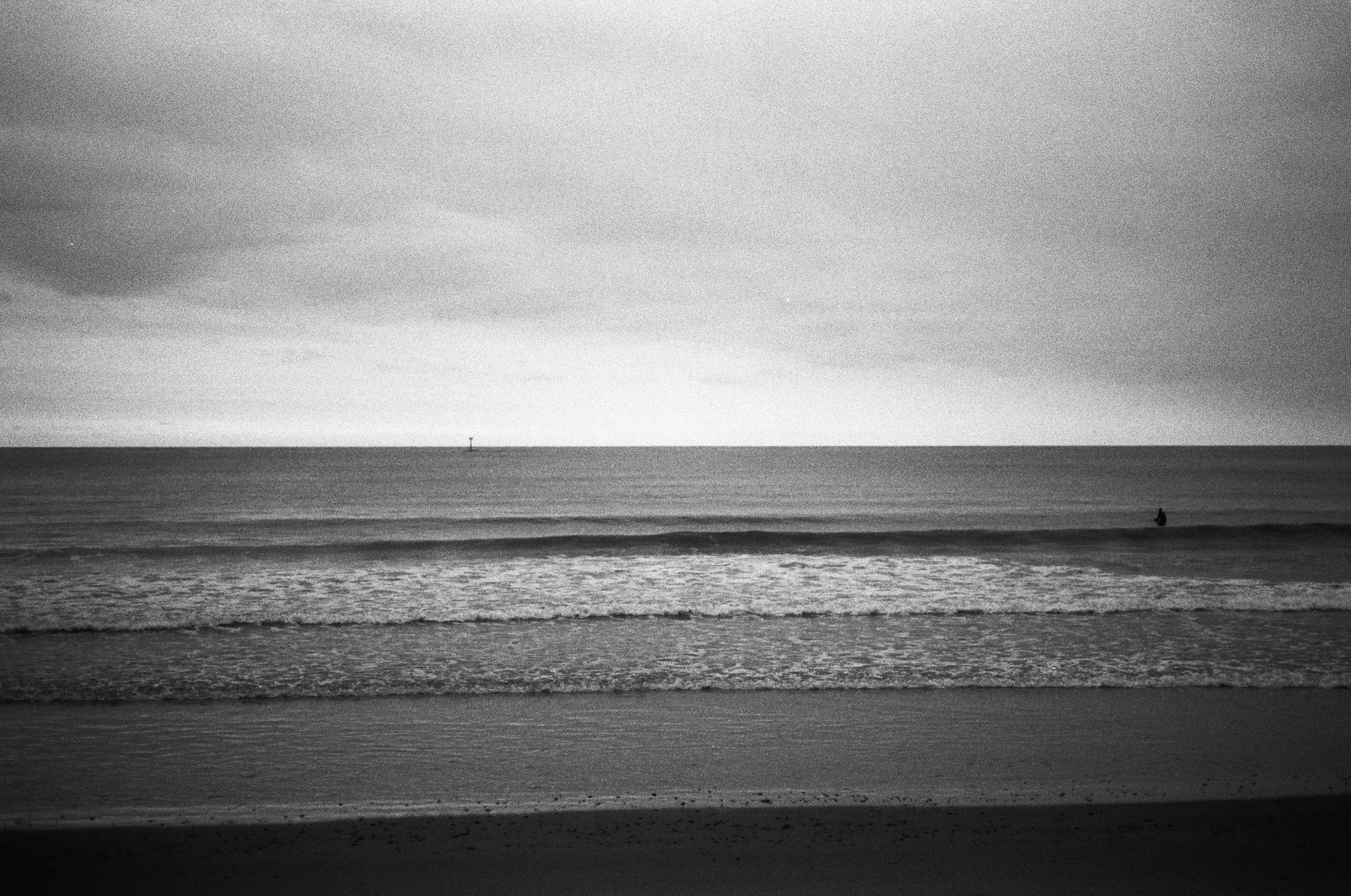 A Surfer Braving the Coming Storm.jpg