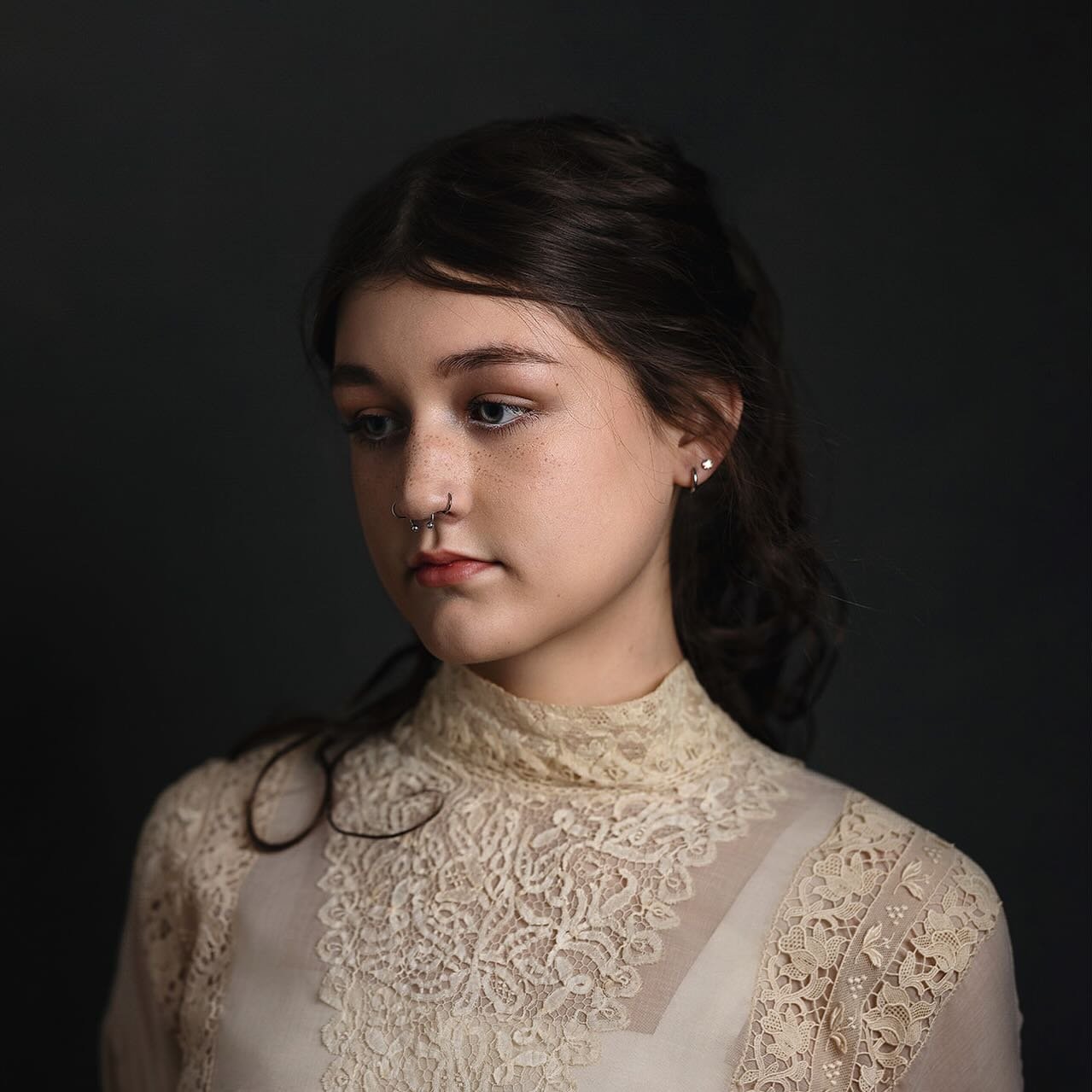 Got to have a little fun with this antique blouse I've had hanging around the studio... I personally love this image, I love the contrast of the modern piercings with the vintage victorian era top. The color, the shadows, the freckles, the detail in 