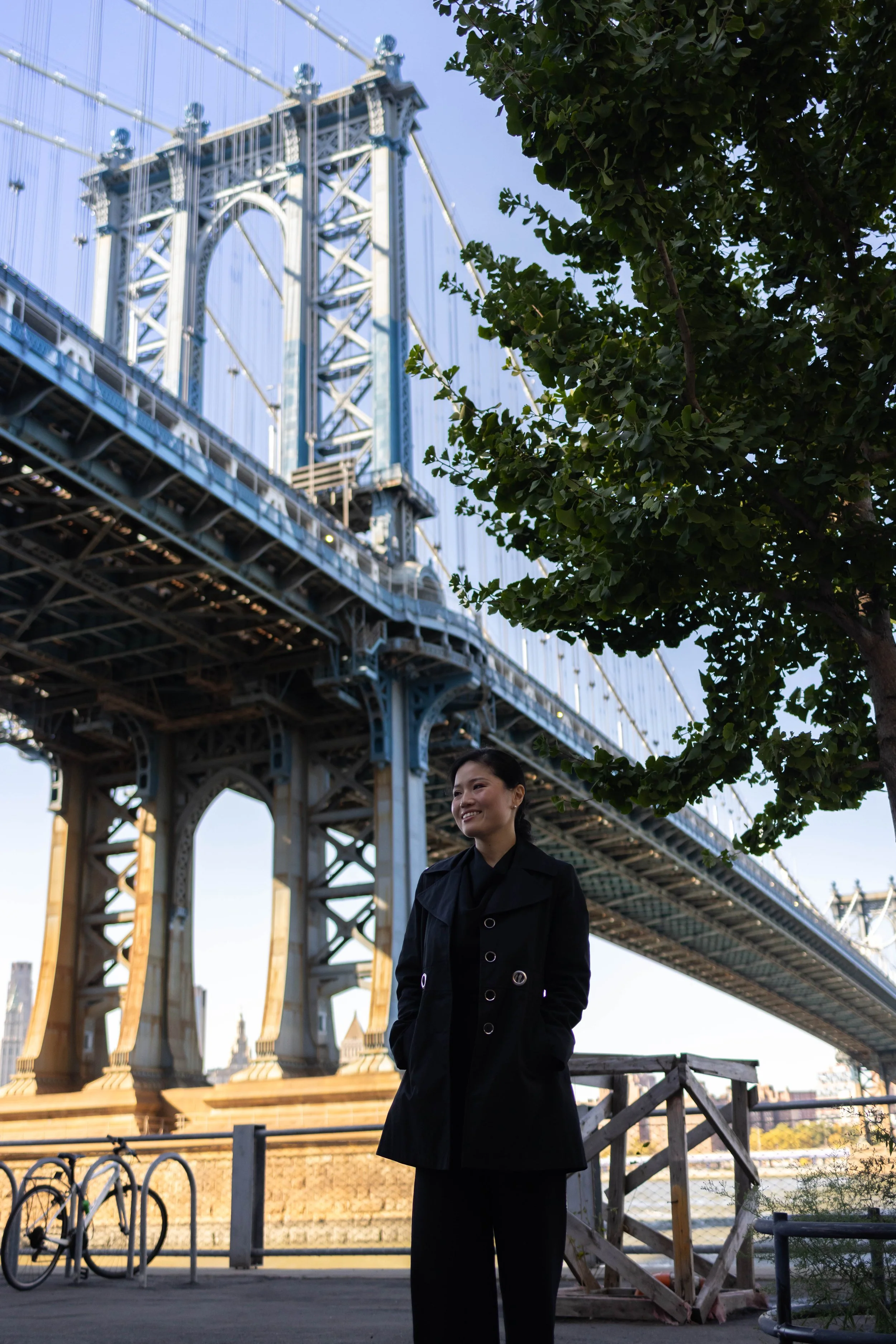 Cara Vitry standing near the Brooklyn Bridge