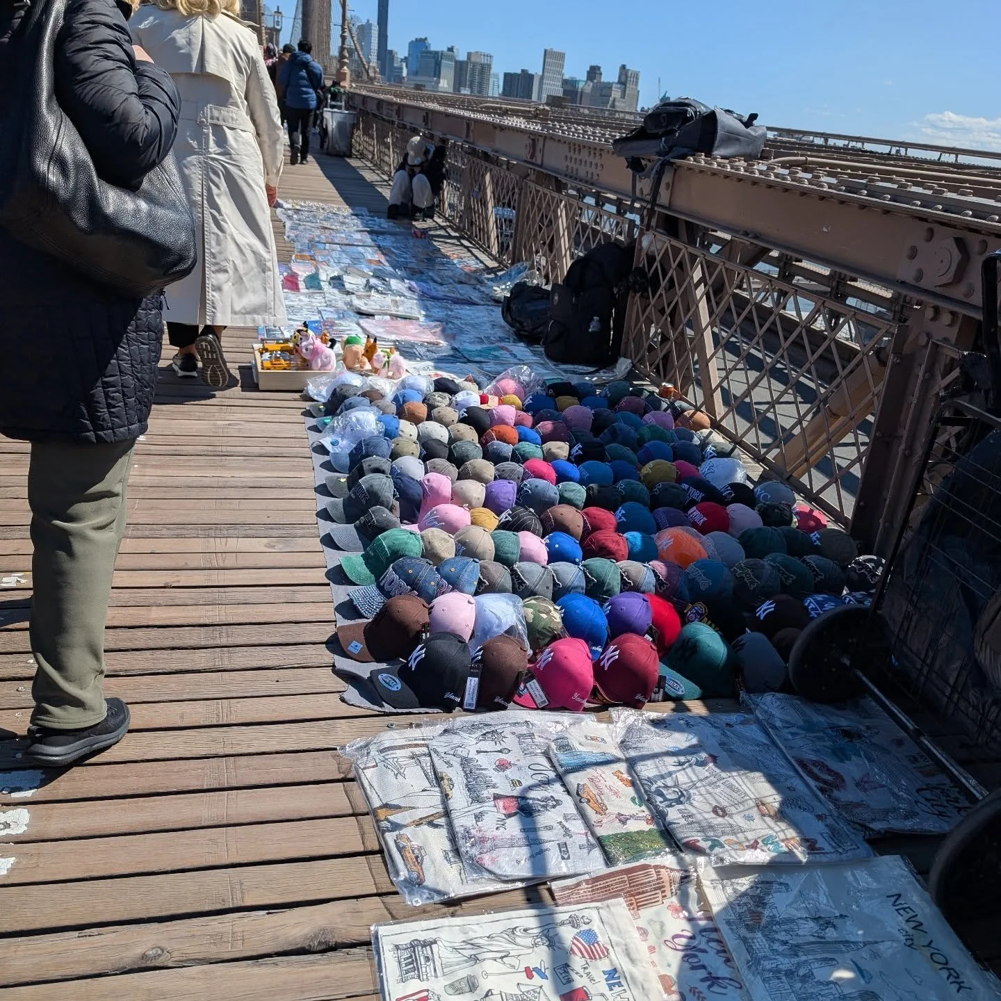 Vendors everywhere on the Brooklyn Bridge. Some laid out the items all the way to the middle line. Not a cop anywhere. 

#novendorsallowed
