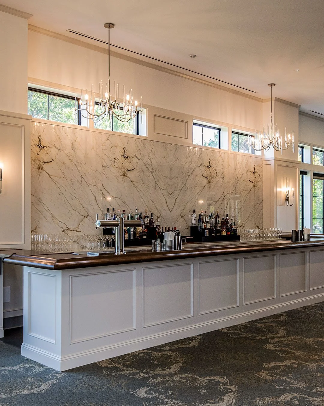 gorgeous white marble and wood bar for banquet facility