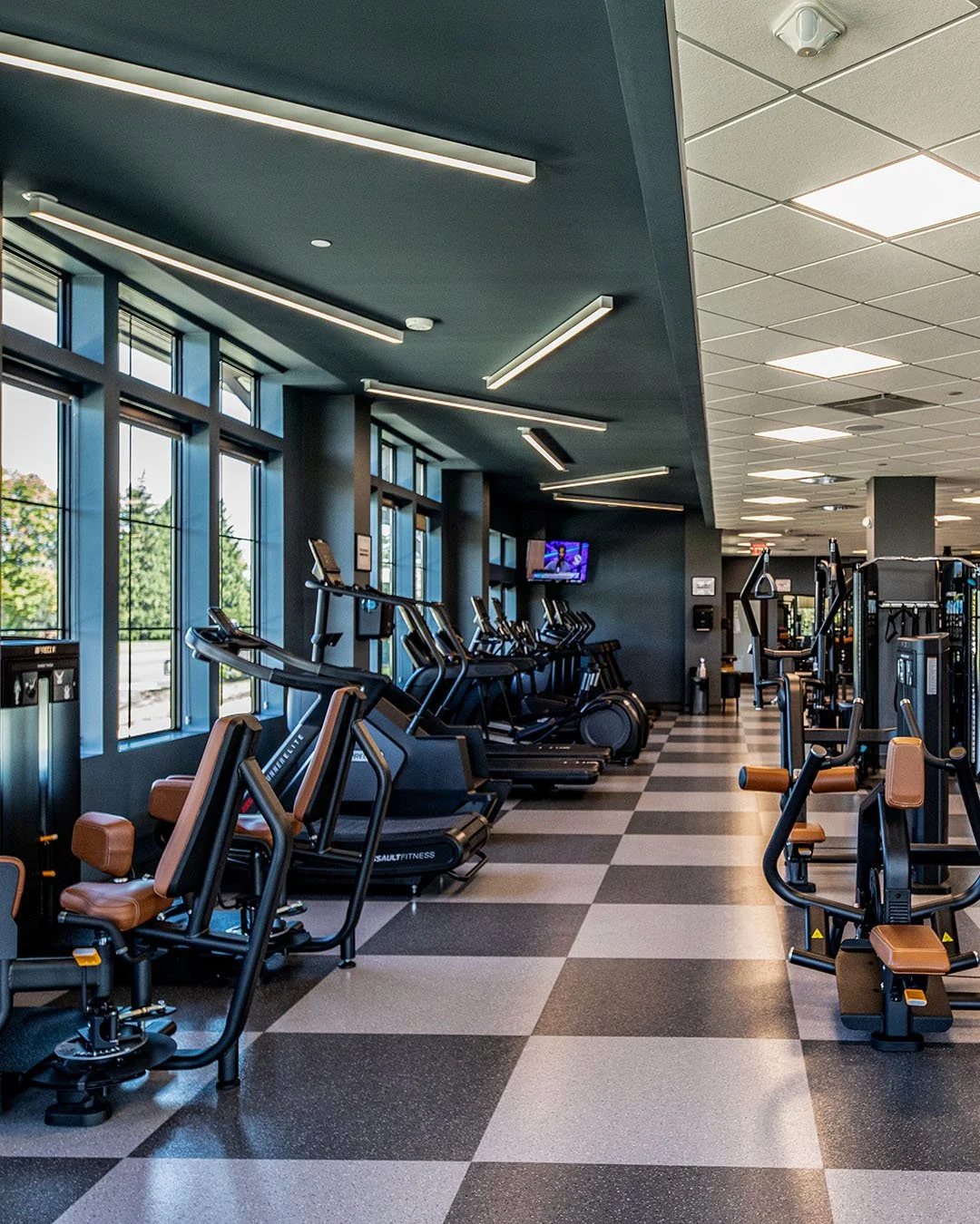 Brookfield Country club gym. boujee gym with checker board flooring
