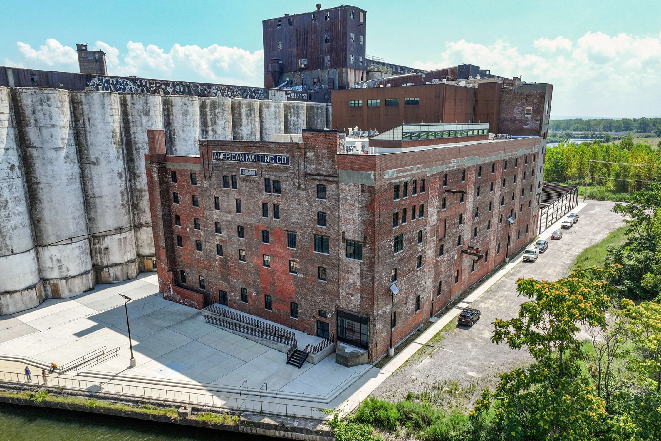 Large brick building, converted grain mill into a mixed-use development