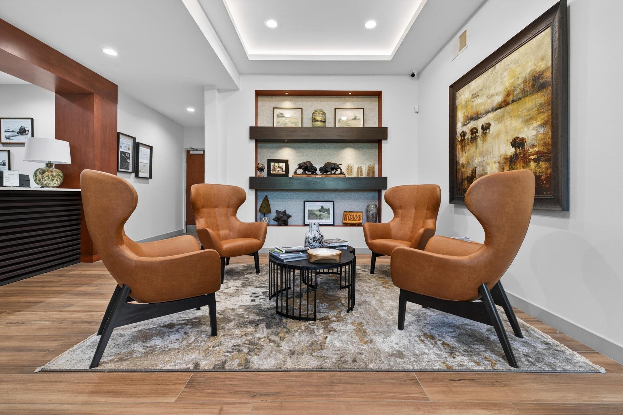 Lobby area of Young Development Offices, Buffalo painting, leather chairs
