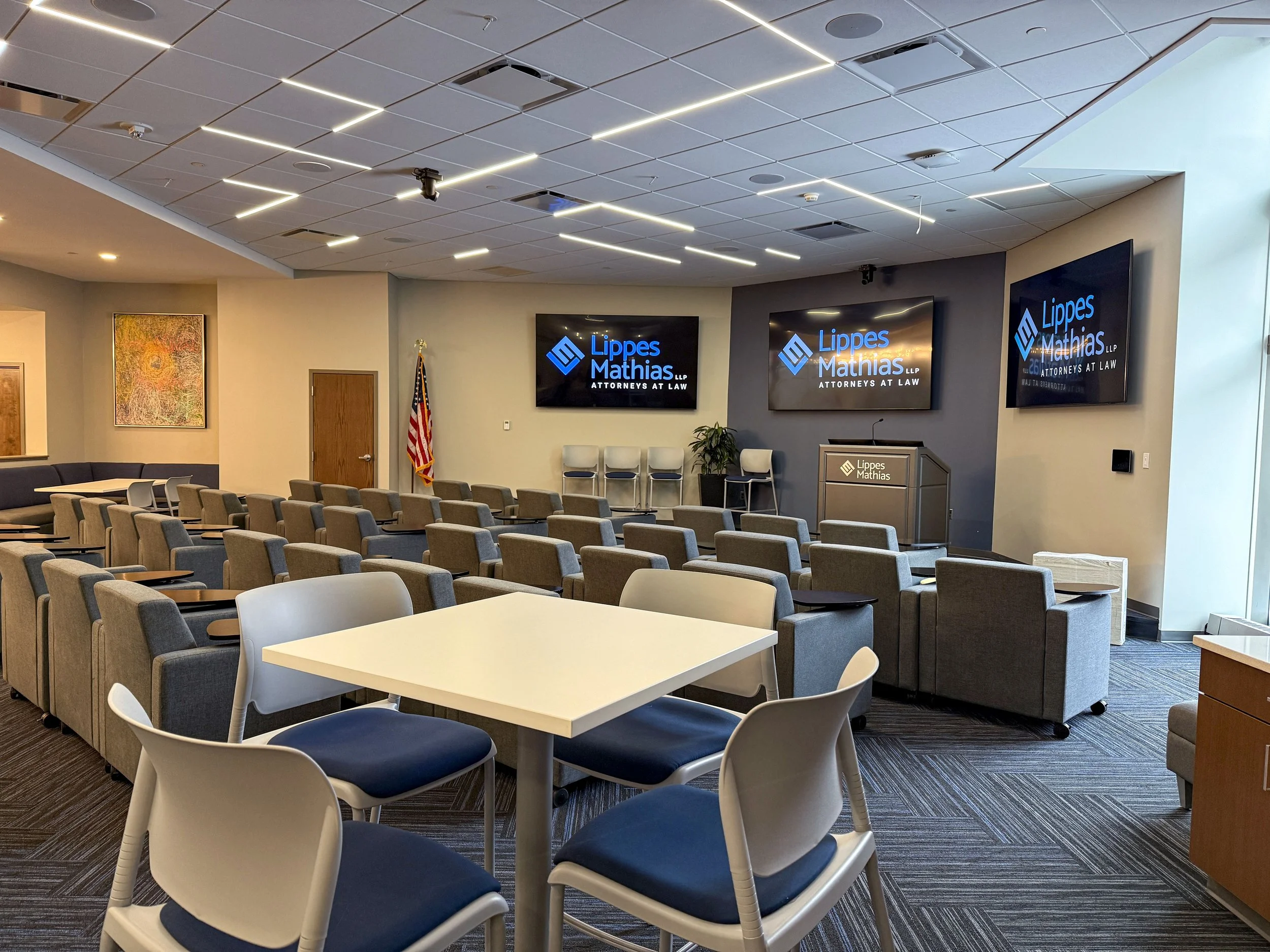 Lippes Mathias room with podium and tvs