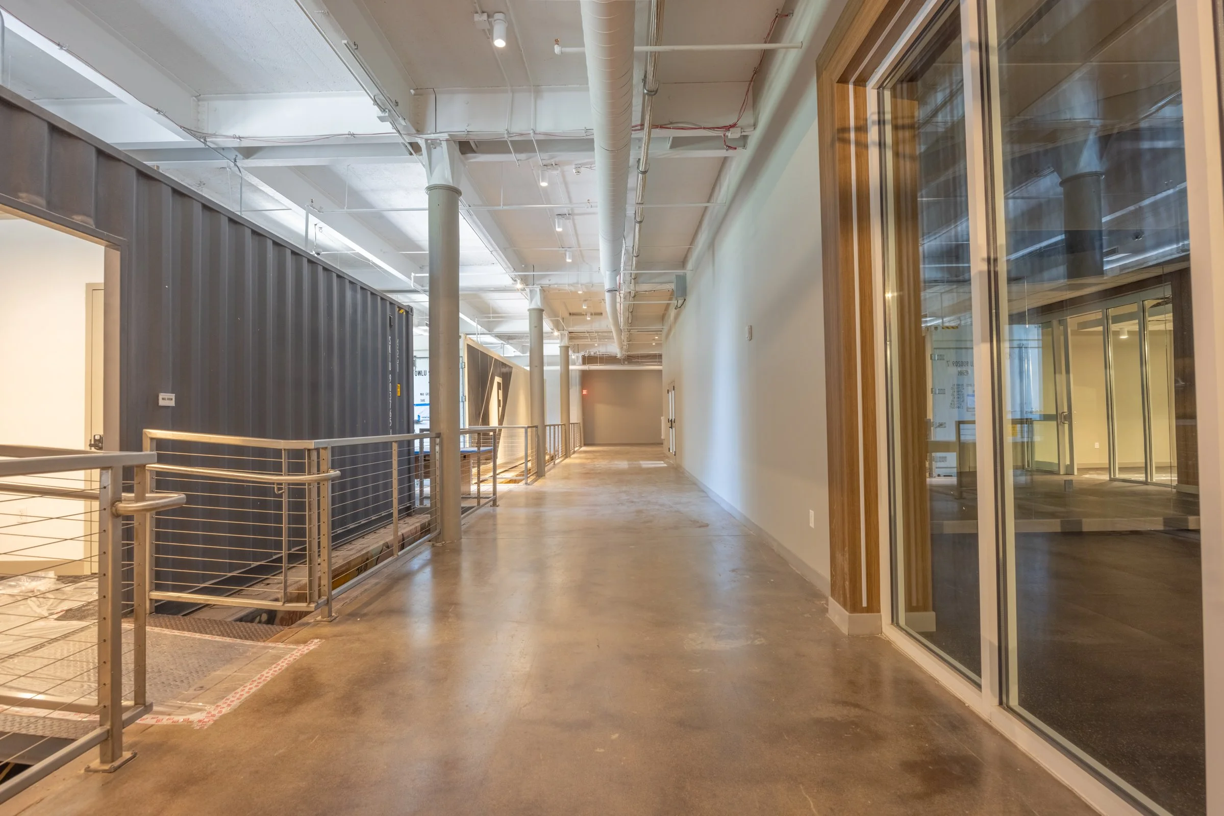 Renovated malthouse with train car and hallway