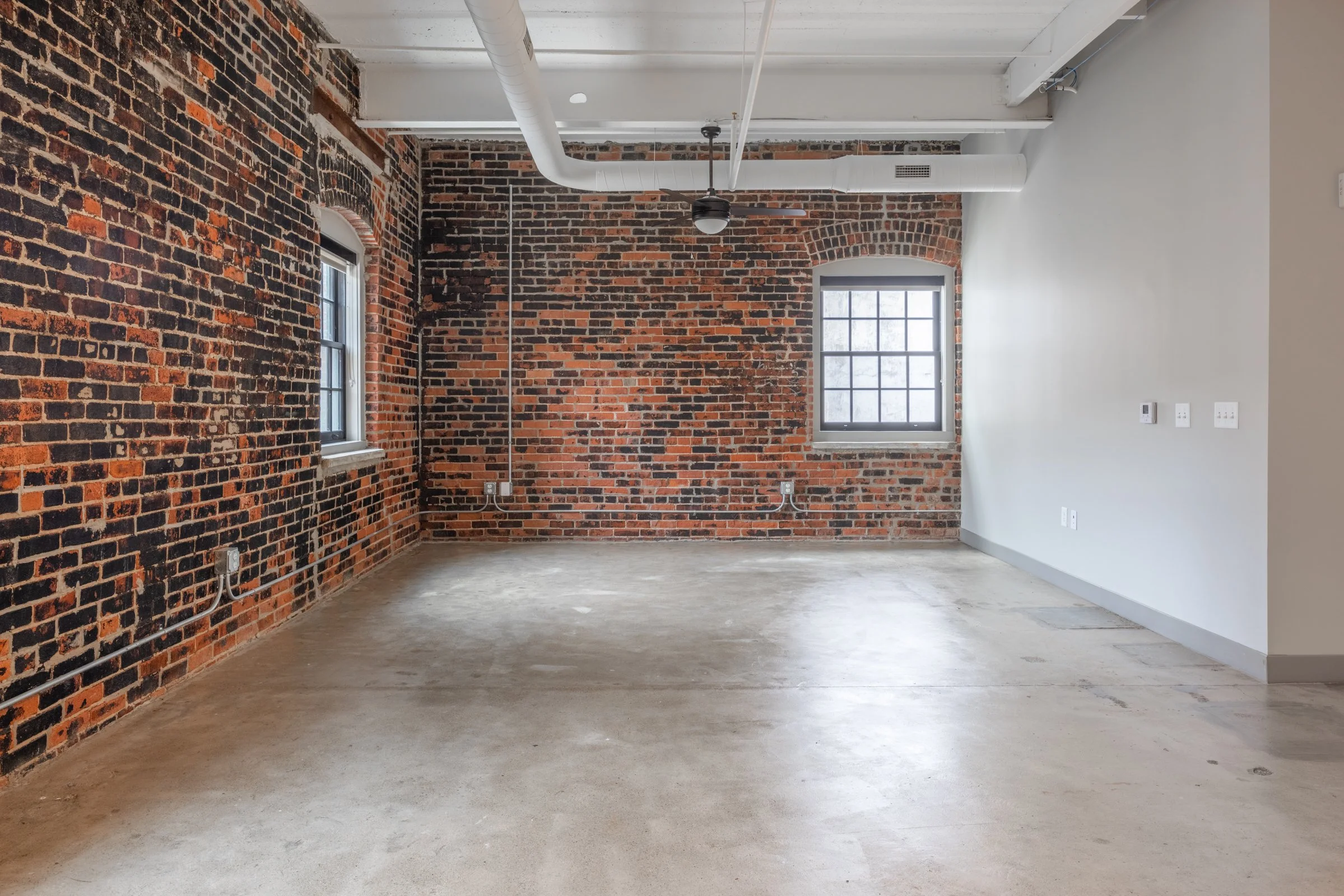 empty room with brick walls