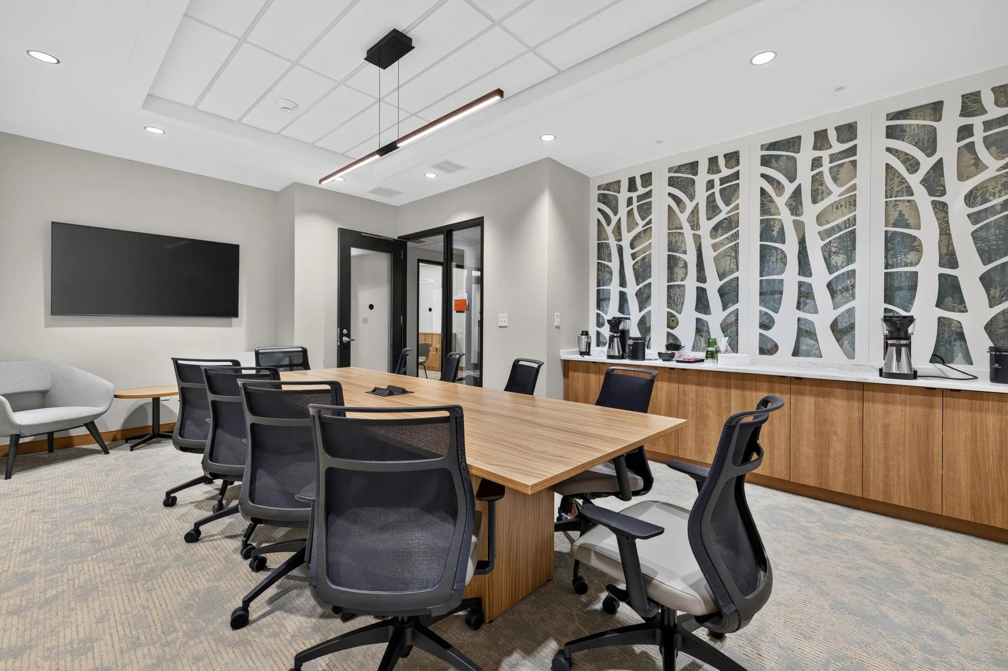 modern office conference room of aebly and associates with art instillation and coffee bar