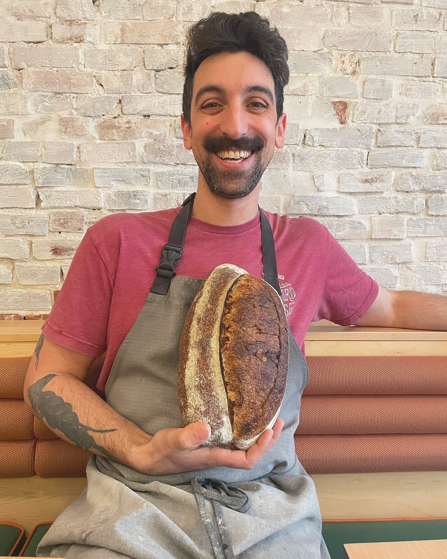 A happy baker with his bread! Open 8 - 1 today if you are in need of a loaf. 🥖