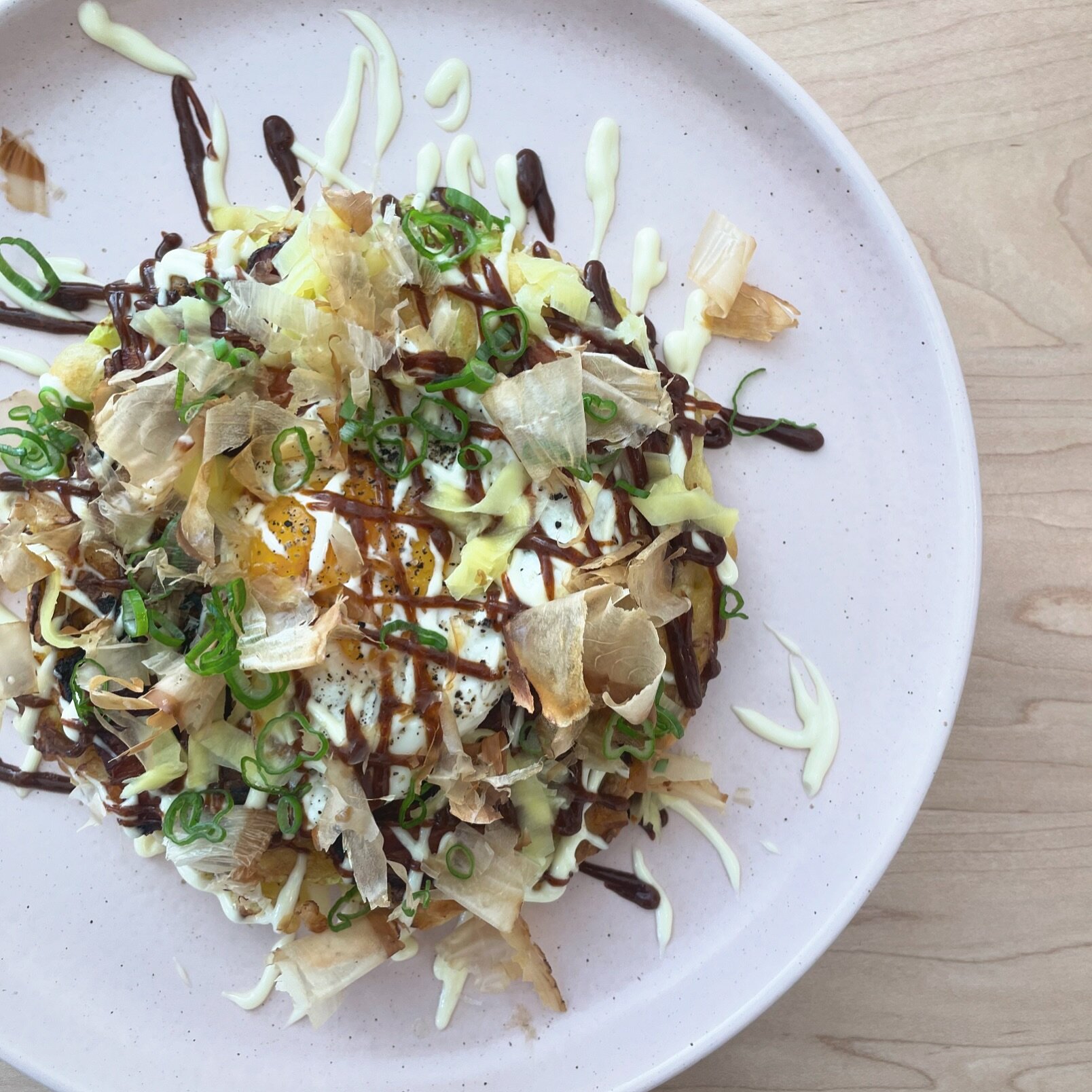 🥬 OKONOMIYAKI 🥬 
Our take on the classic Japanese pancake - light and fluffy, with napa cabbage, @broadarrowfarm pork belly, sunny side up egg, pickled ginger, bonito flakes, house-made &ldquo;kewpie&rdquo; mayo, and pickled plum hoisin. Limited qu