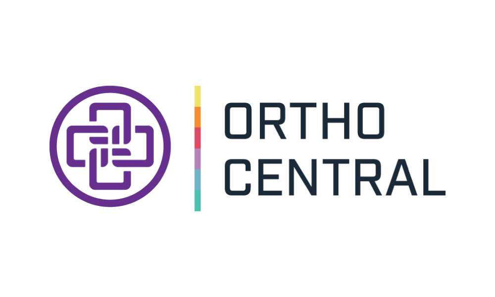 Logo of Ortho Central featuring a purple geometric cross symbol, a vertical multicolored line, and the company name in dark blue text.