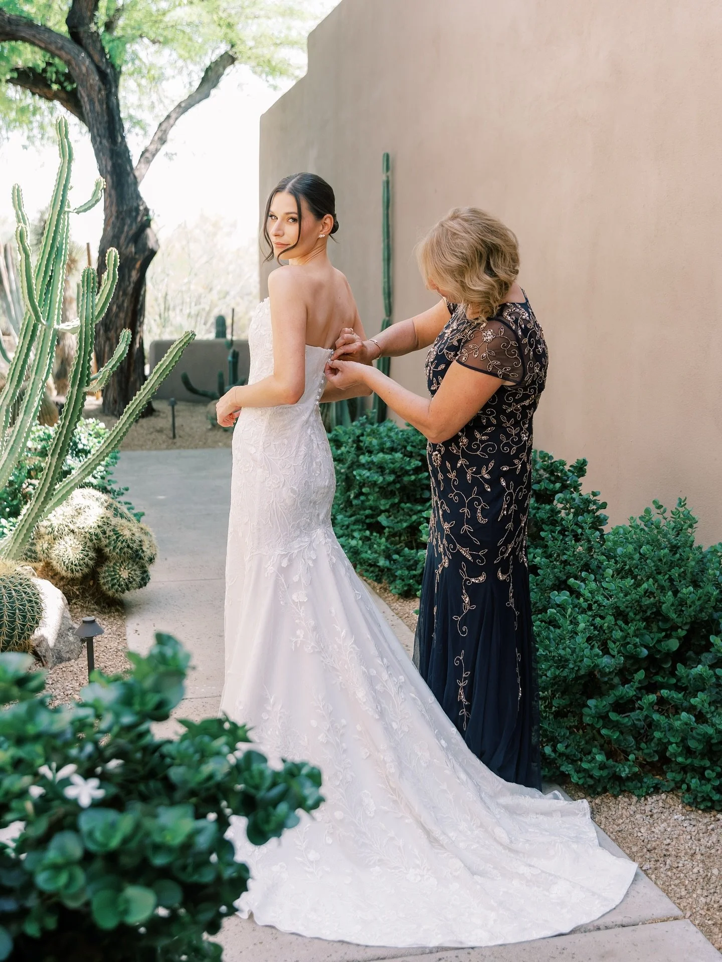 The quiet before the day unfolds &mdash; soft laughter, your loved ones hands gently buttoning a dress, the hum of anticipation filling the space. These moments hold a different kind of beauty&hellip; one that&rsquo;s unposed, intimate, and full of e