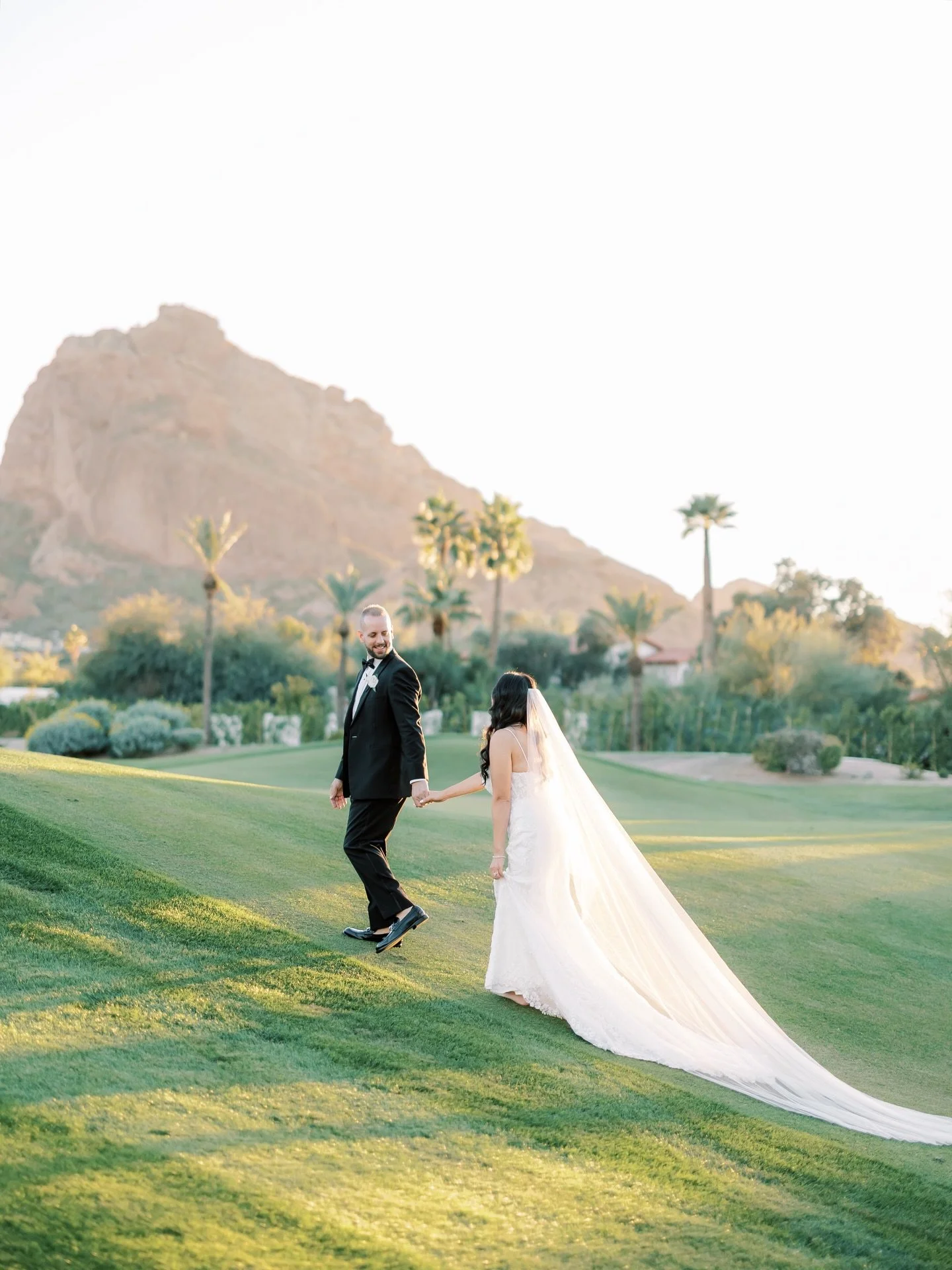 Golden hour under Camelback mountain hits different✨

Planning: @kdpeventsaz 
Venue &amp; Catering: @mountainshadowsweddings 
Photography: @meagangibsonphotography 
Content Creator: @comptoncontent 
Florals: @flowersbyjodi 
DJ: @tregothedj 
Cake: @ab