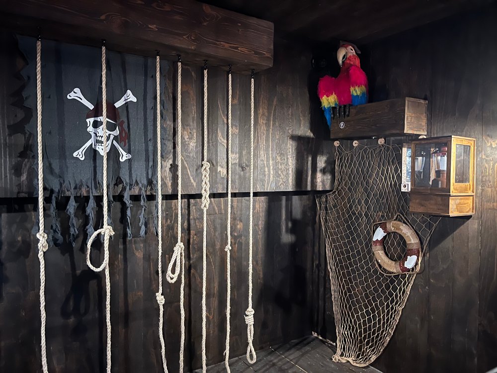  "The Pirates of Tortuga" takes place on a pirate ship where you solve different puzzles to escape. – Photo by Elizabeth Basile 