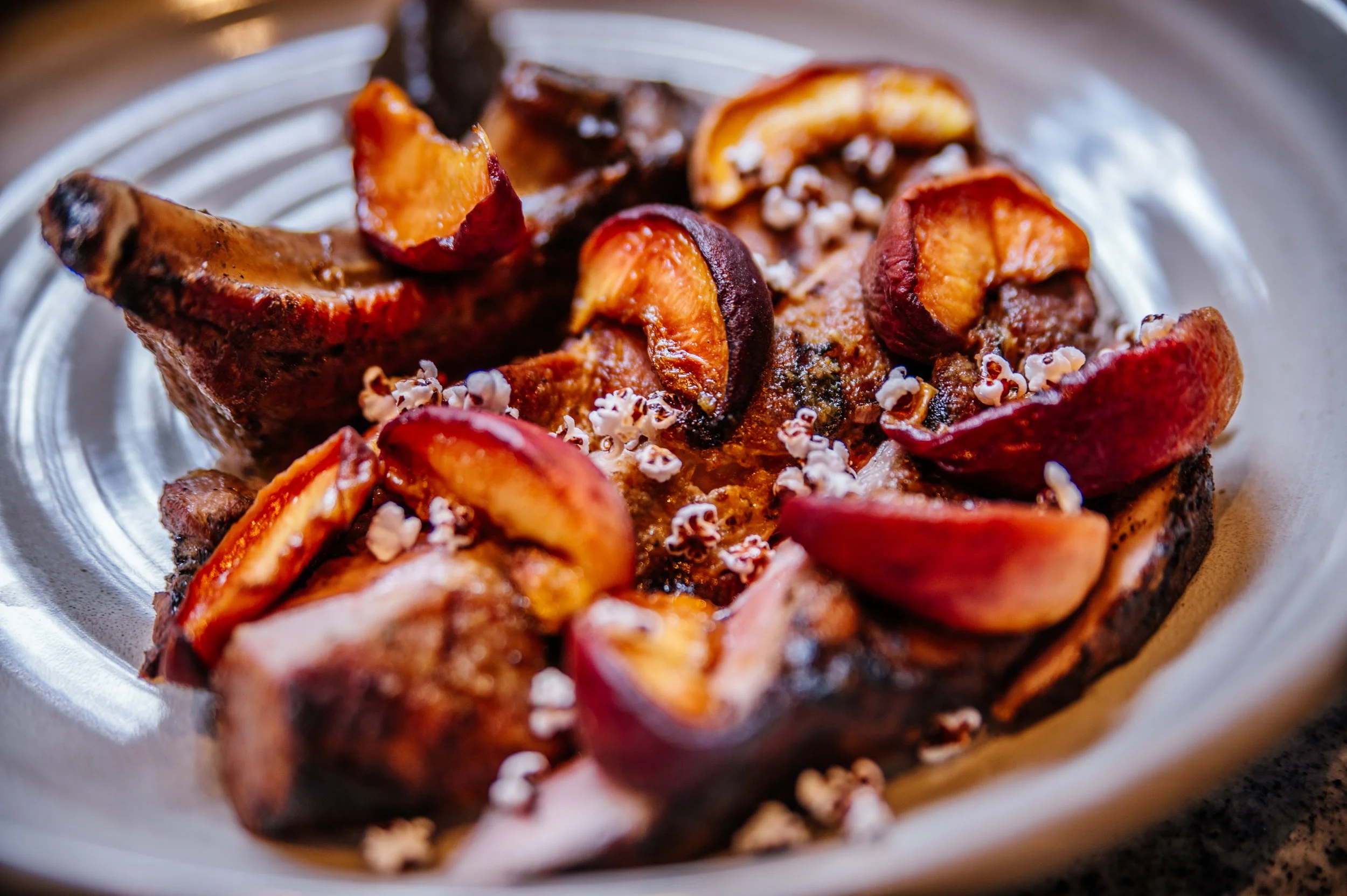 peaches and meat dish close up