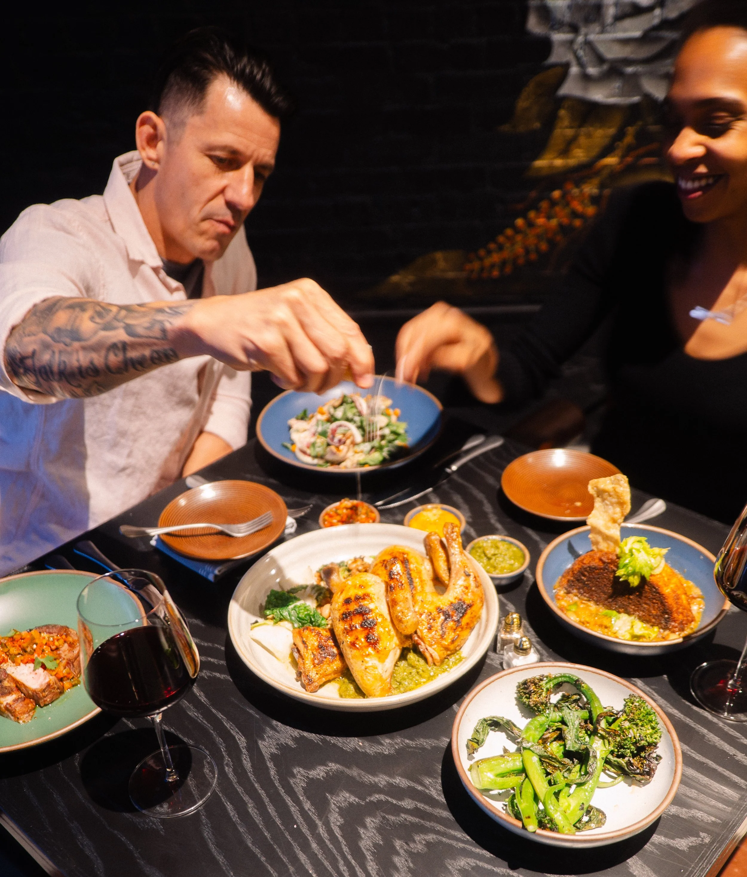 people eating table of food