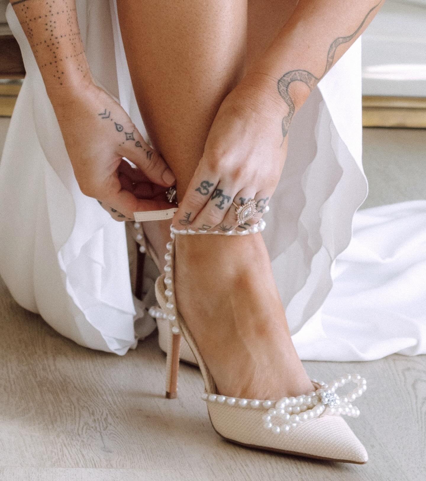 Obsessing over the details ✨ Loving how @bonschro&rsquo;s tattoos add the perfect touch to this close-up shot. 💫 #weddingphotography #stlwedding #stlweddingphotographer #tattooart #detailshots #weddinginspo