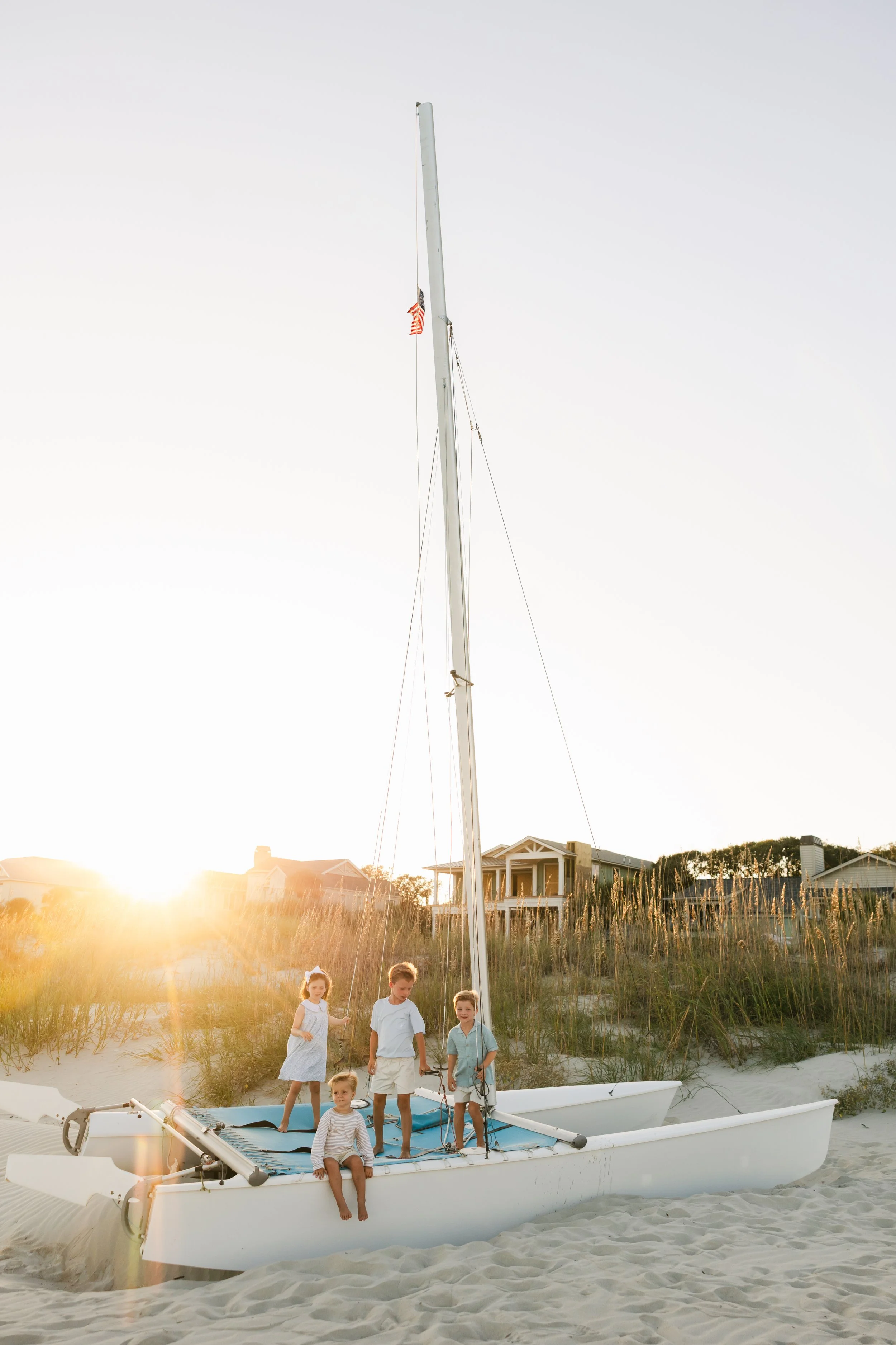 Sea Pines Resort Beach Family Photography Session with Sailboat