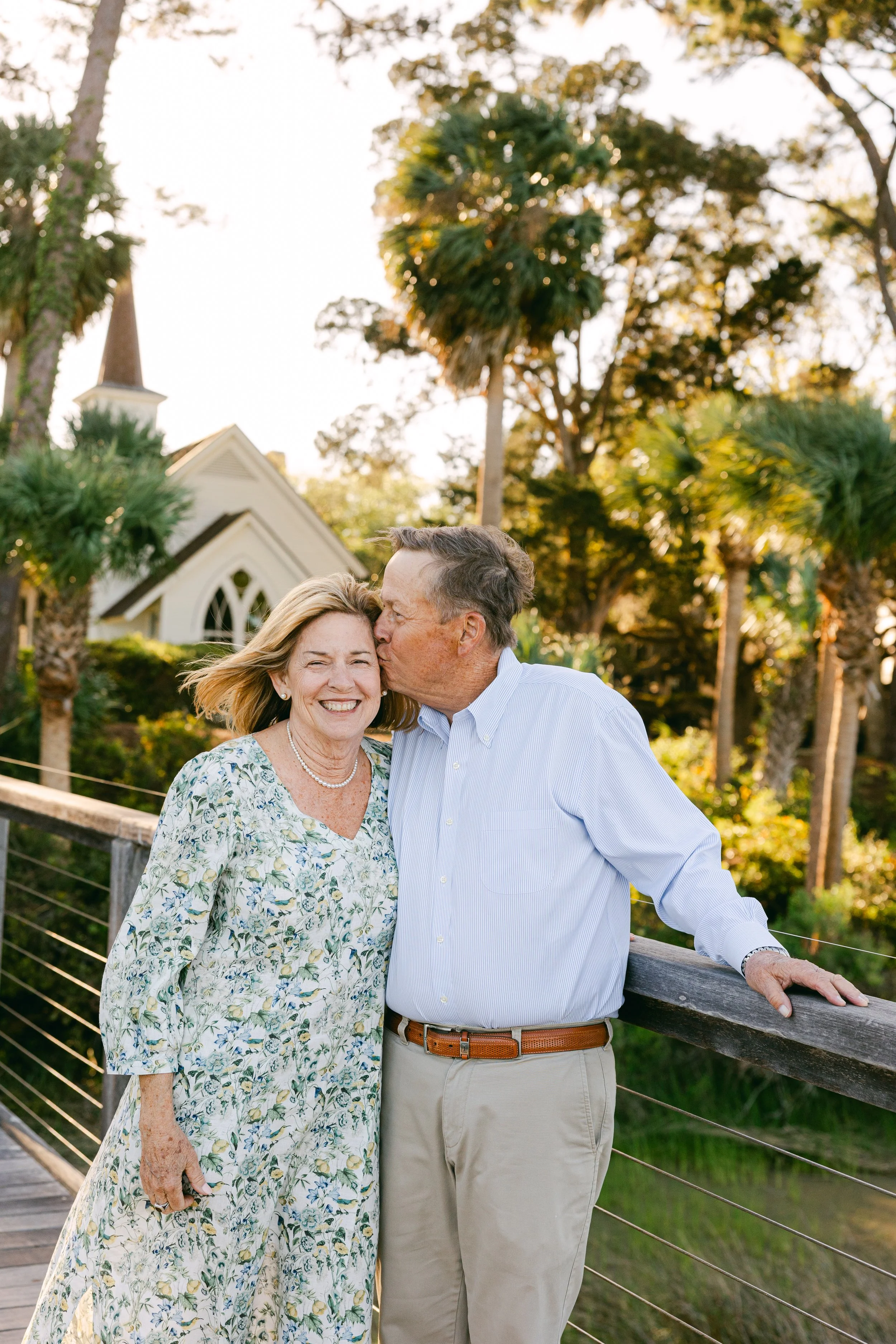 Montage Palmetto Bluff couple photography session with Wilsons Village Chapel on dock.