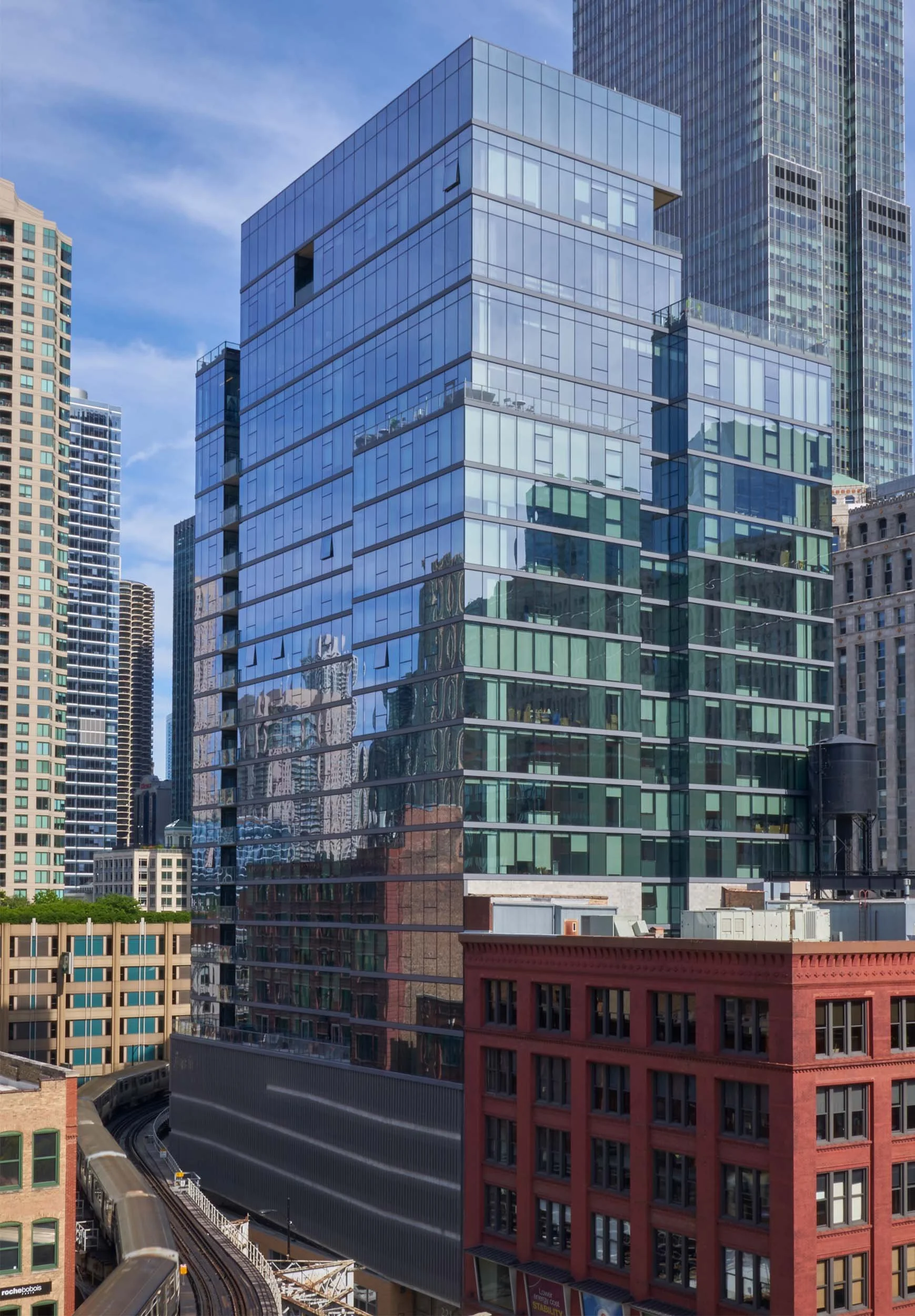 Glass clad multifamily high-rise apartment