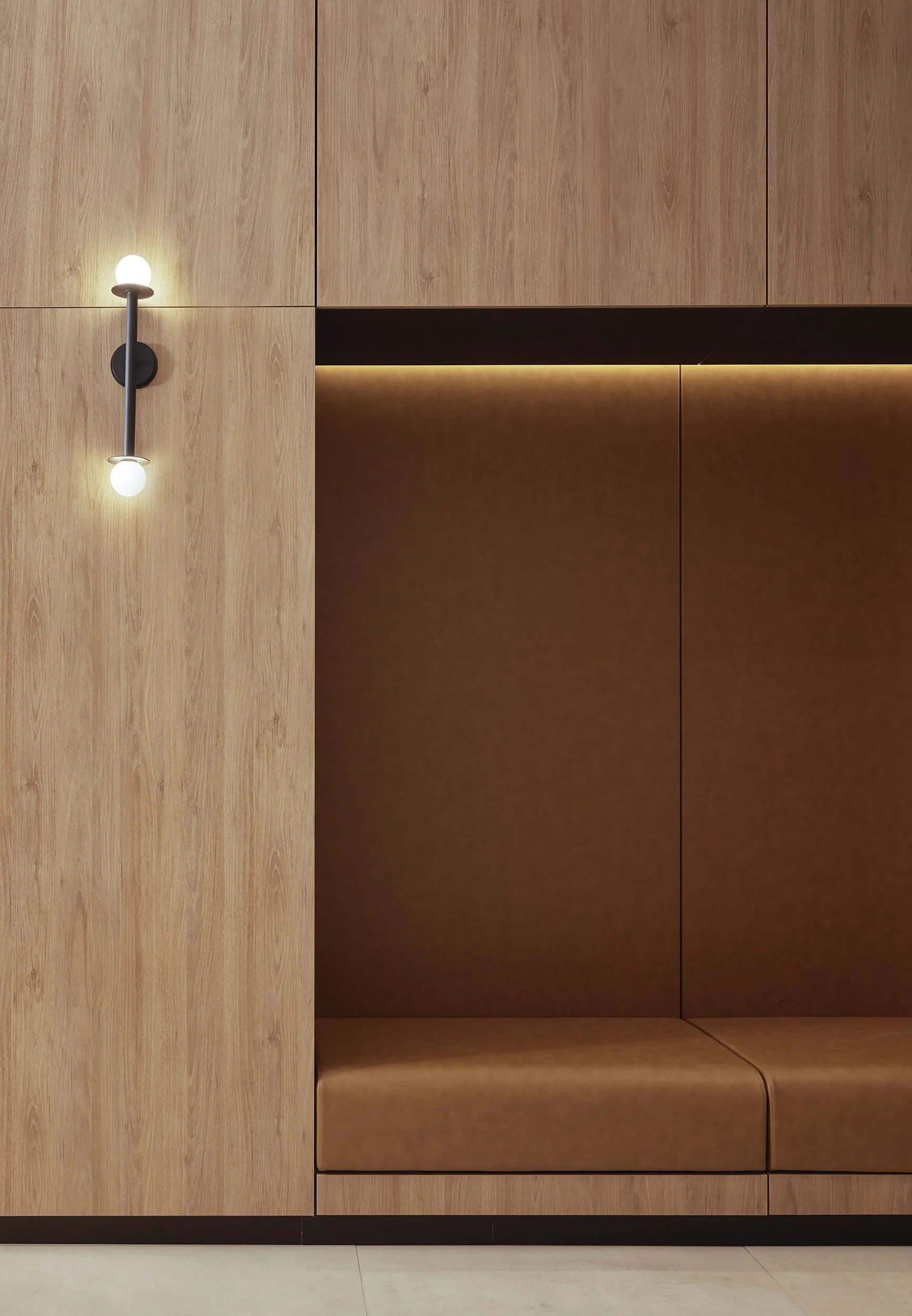 Millwork wall with integrated leather seating