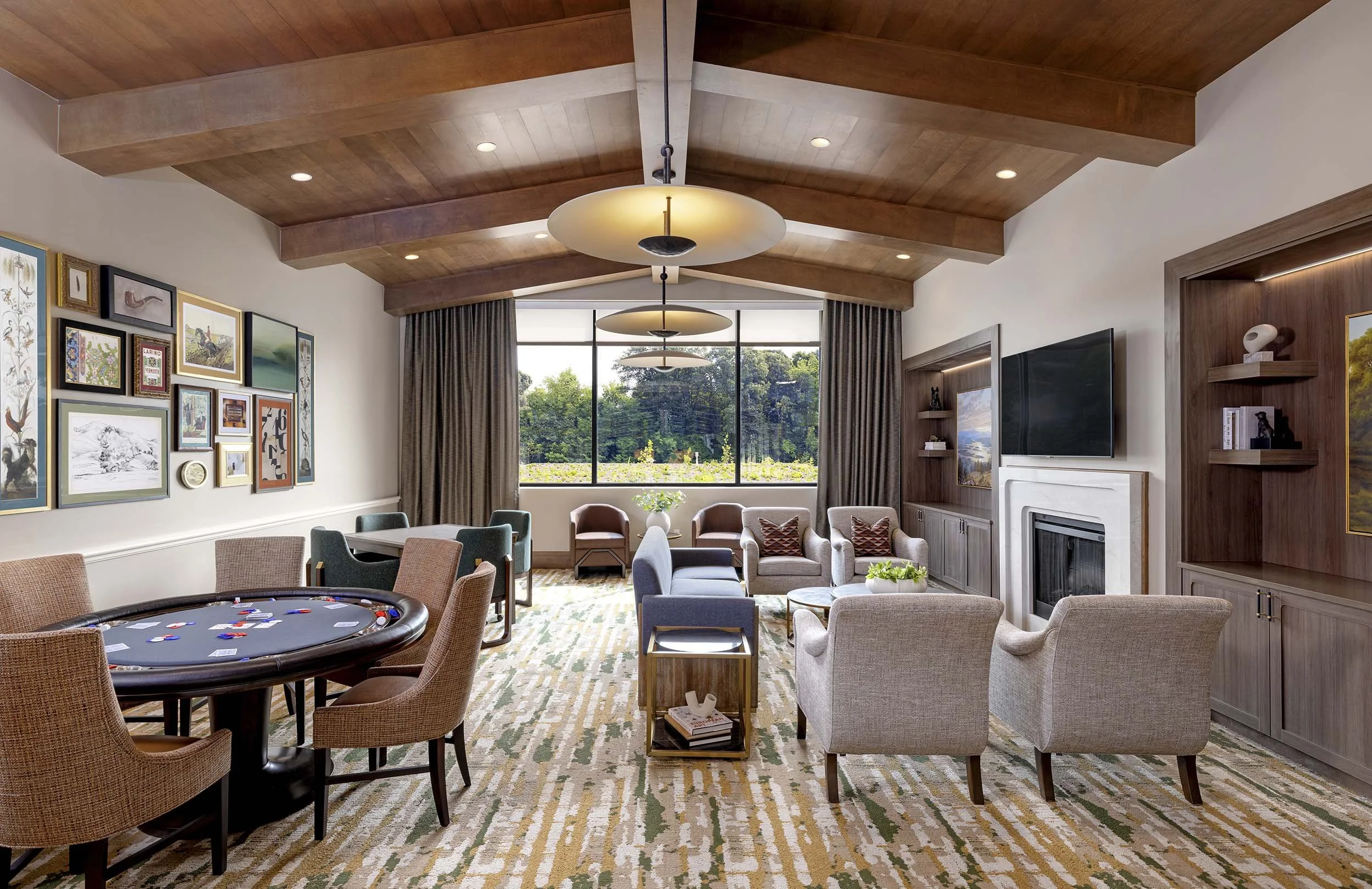 Senior living club lounge, wood ceiling and niche, poker, stone fireplace