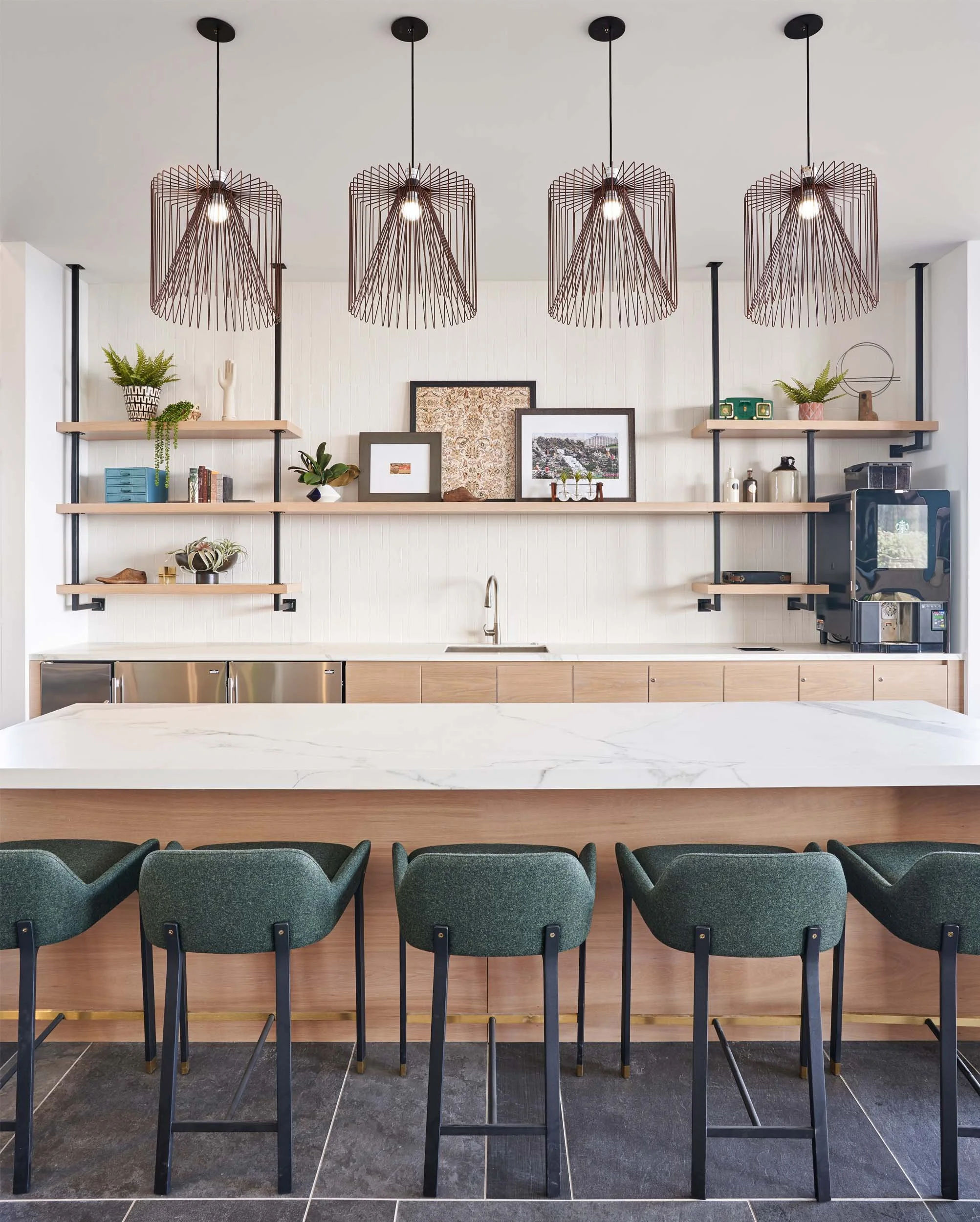 Coffee bar hospitality kitchenette with bent wire pendants, vintage accessories