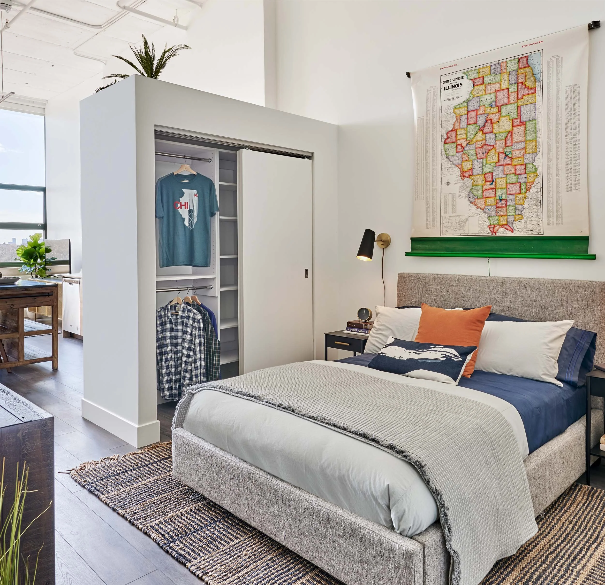 Studio bedroom with map above bed