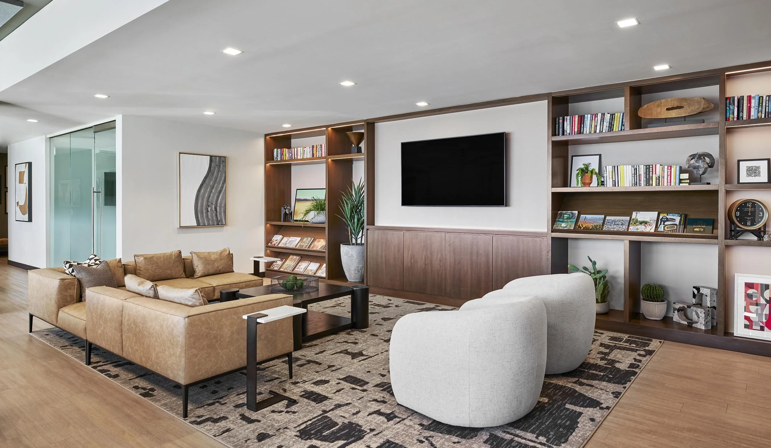 Walnut millwork TV wall and lounge