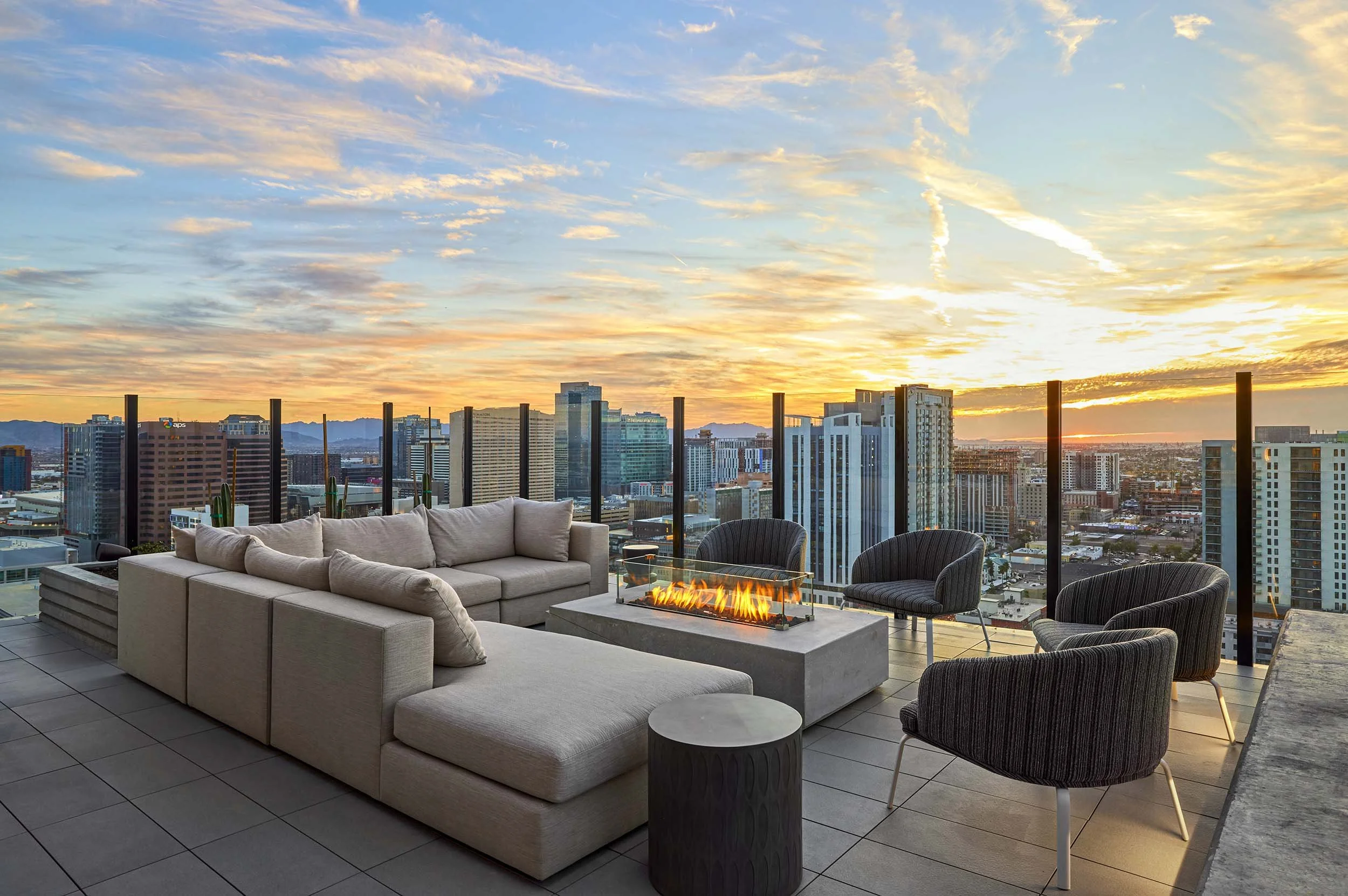 Rooftop fireplace lounge and sunset