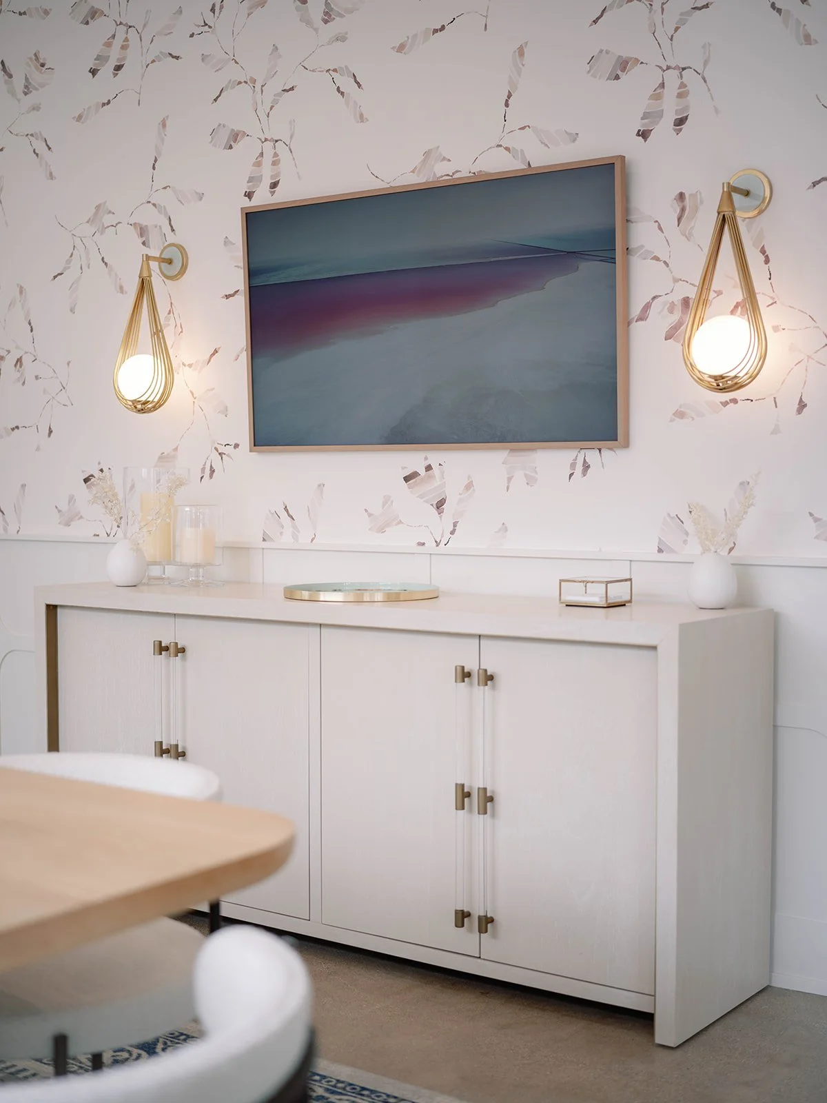 Credenza with acrylic and bronze handles and gestural abstract painting