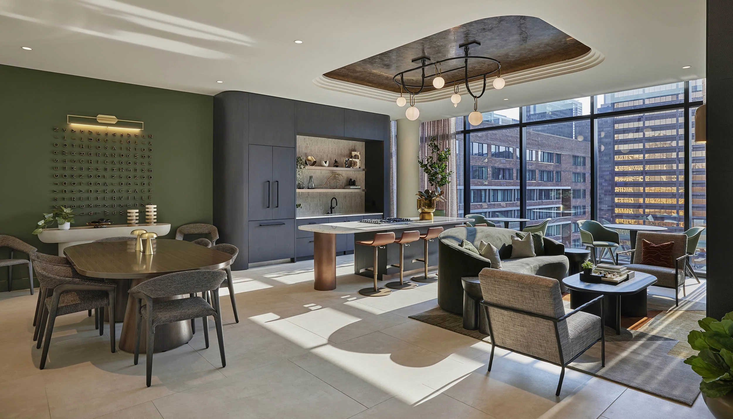 Resident lounge with emerald green, bronze, and charcoal features