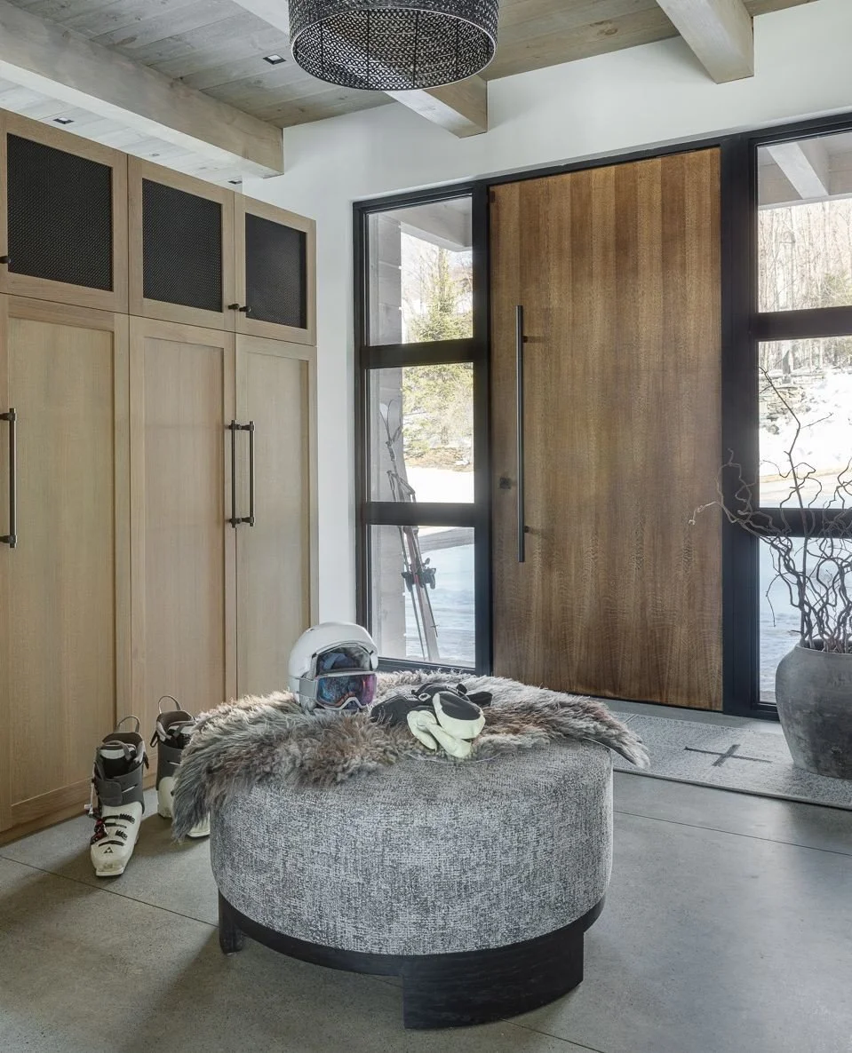 The only thing better than the first run of the day? The feeling of walking into this entry when it&rsquo;s over. 🏔️✨⁠
⁠
Our solution? A custom-designed luxury mudroom where every piece of equipment has a designated, hidden home. Beautiful enough to
