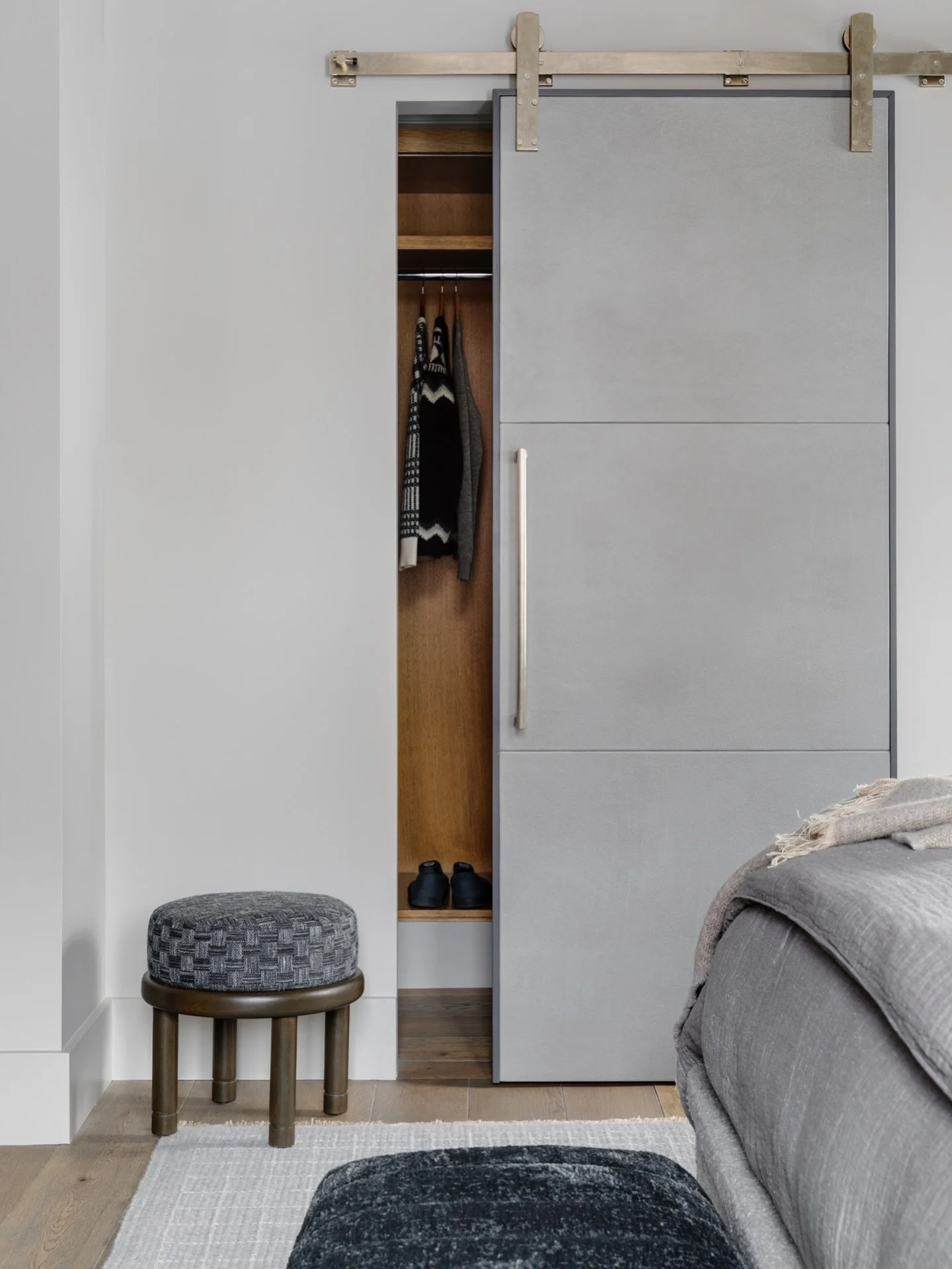 When working with clients, every detail is considered. Every space is different, and we often try to create custom solutions for our clients. This chic closet is a custom suede wrapped barn door, just as beautiful as it is functional. ⁠#KennerknechtD