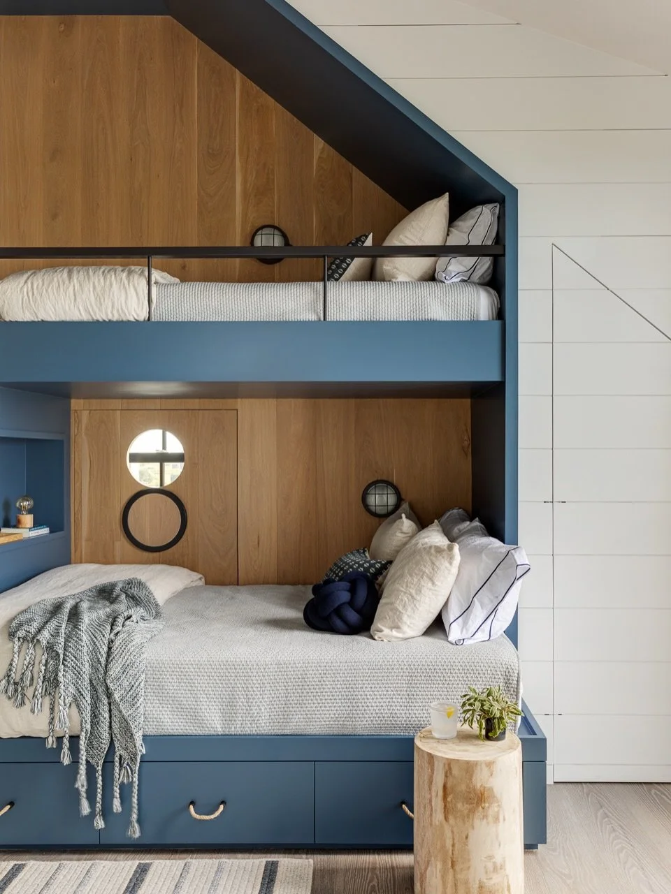 Room for all at our Ocean&rsquo;s Edge Home. This home is meant for weekend hosting, with custom bunk, with built in storage underneath for guests to unpack their bags and stay awhile. This room is framed by a patio and ensuite bathroom for guests to