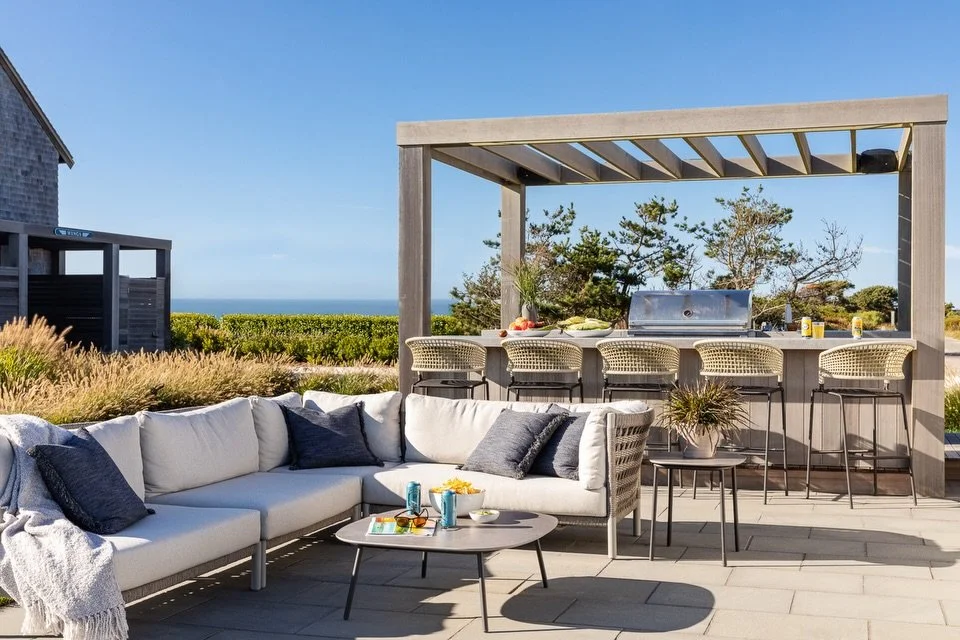 The ideal setting for happy hour, this expanded patio is designed for effortless entertaining. With an ocean-view bar, outdoor kitchen, and generous gathering space, it&rsquo;s made for al fresco evenings. Weathered wood and woven textures, set again