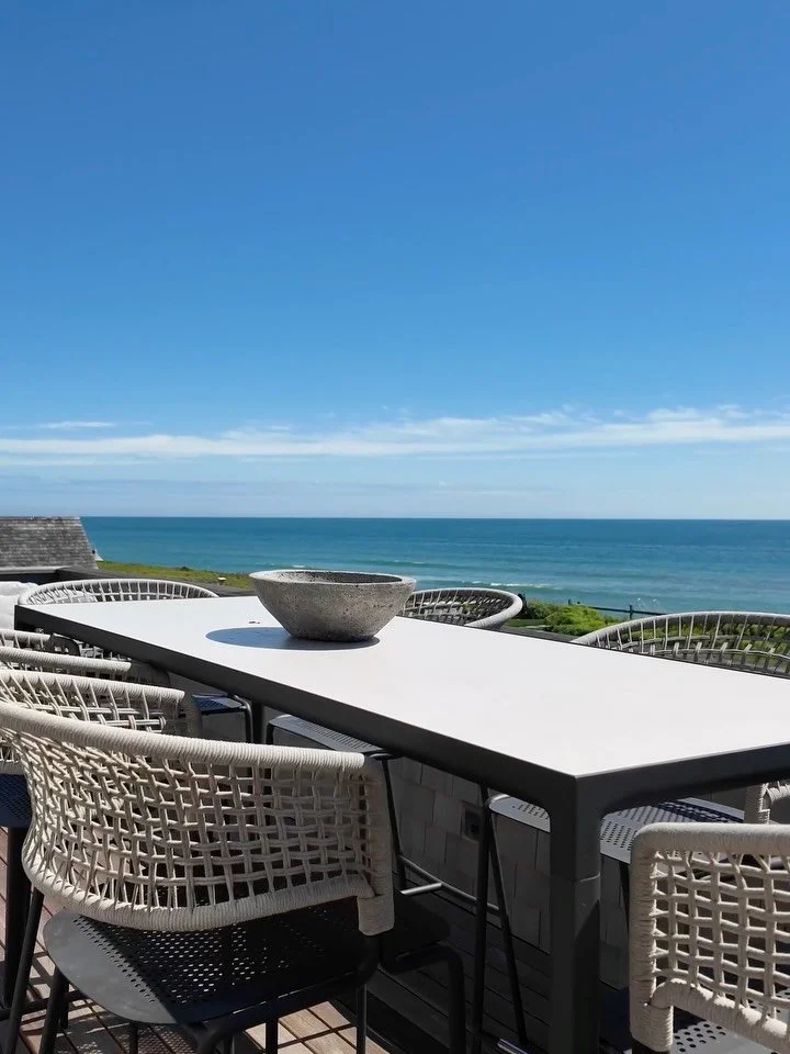 Taking a seat at the Ocean&rsquo;s Edge. We opted for weathered and woven seats that invite guests to linger a bit longer, and clean lines that blend into the horizon. #KennerknechtDesignGroup⁠
⁠
#interiordesigner #nantuckethomes #interiordesign #bea
