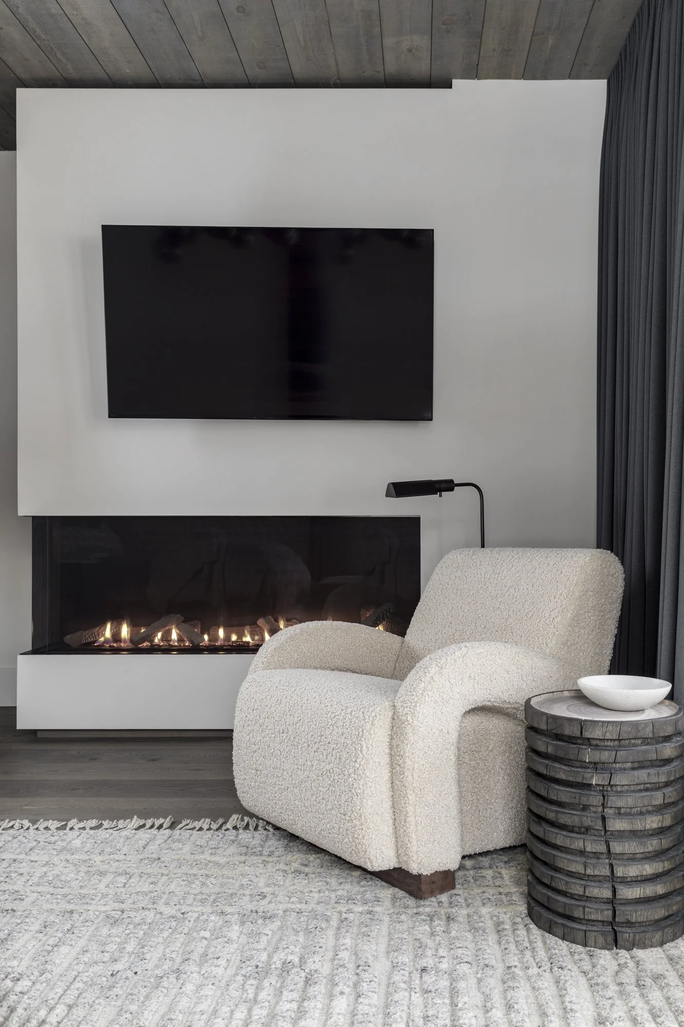 SprucePeak_GuestBedroomFireplace.jpg