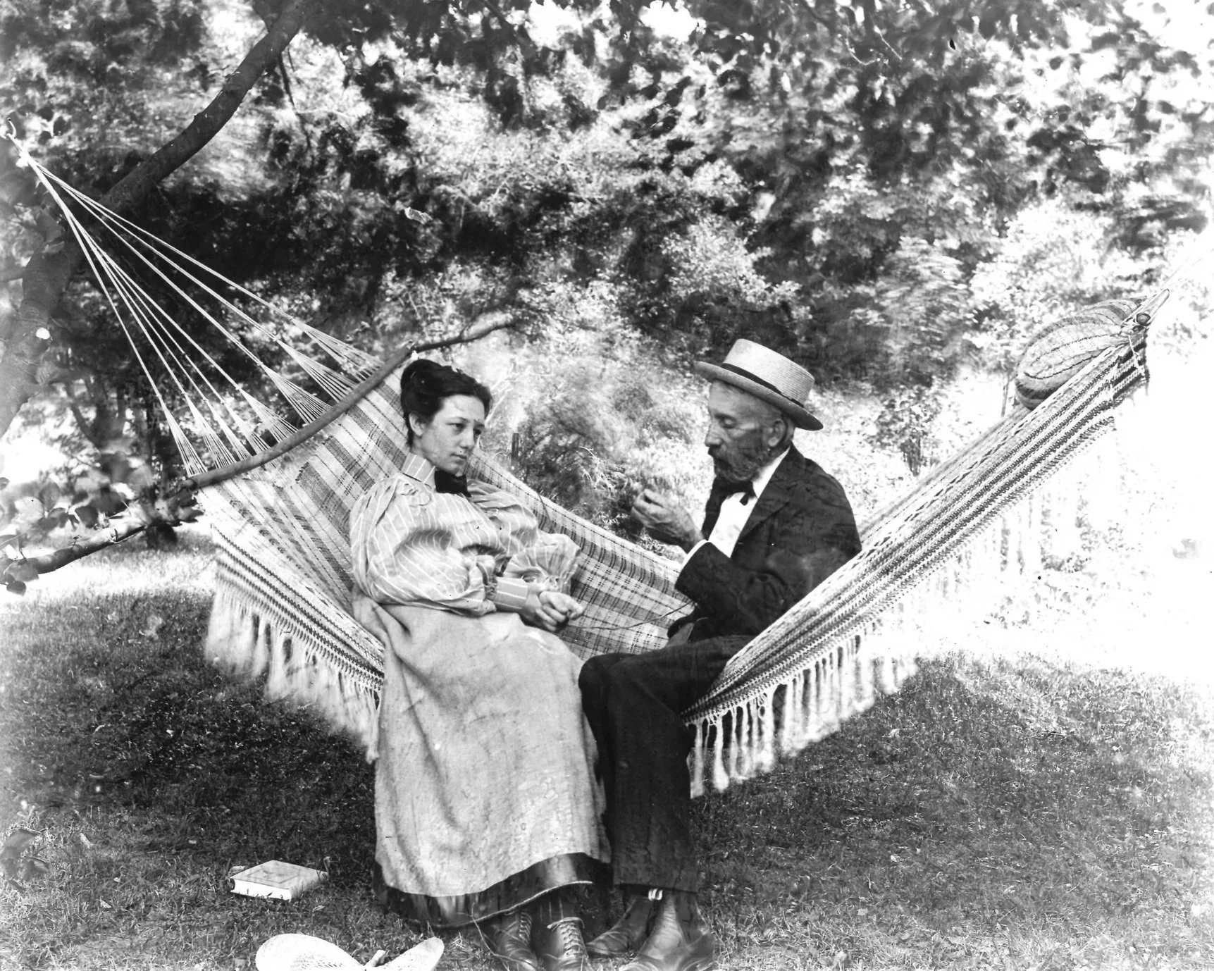 Ralph M Munroe and Jessie W Munroe on a hammock, self portrait