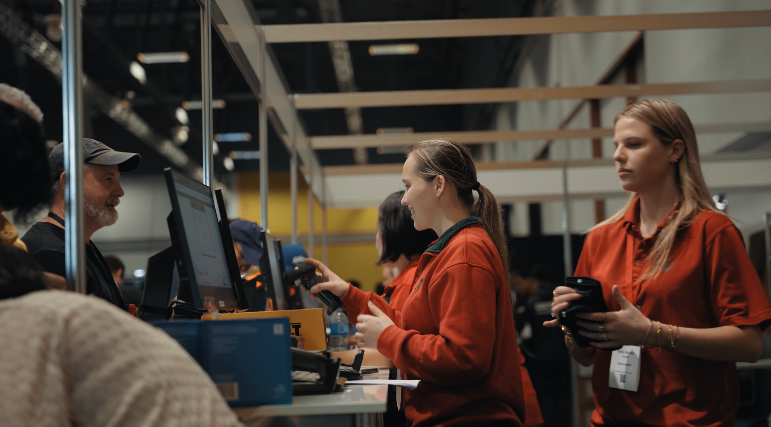 Bunnings team members at the checkout counter during the Bunnings Trade Expo