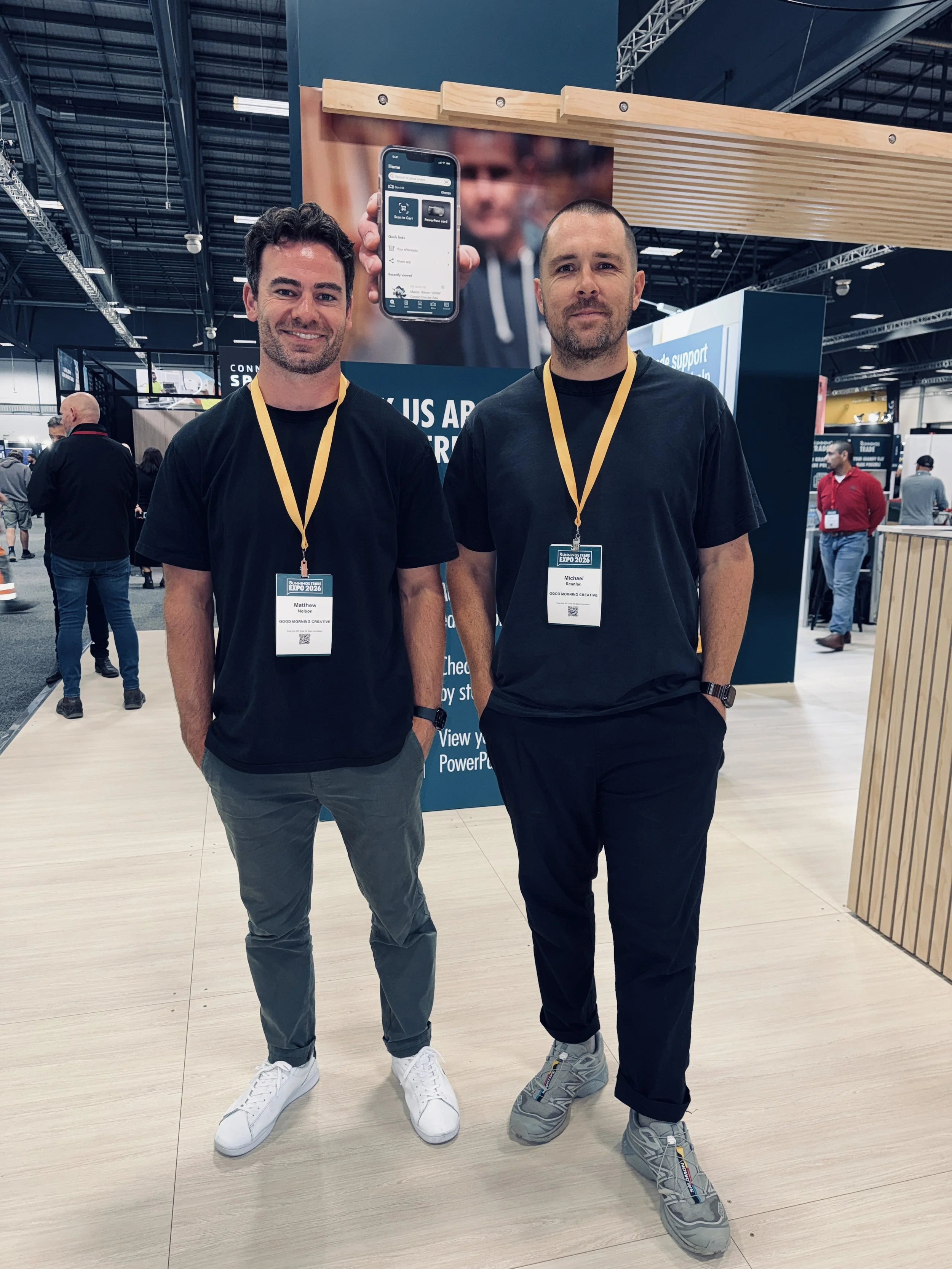 Two members of the Good Morning Creative team on site at the Bunnings Trade Expo