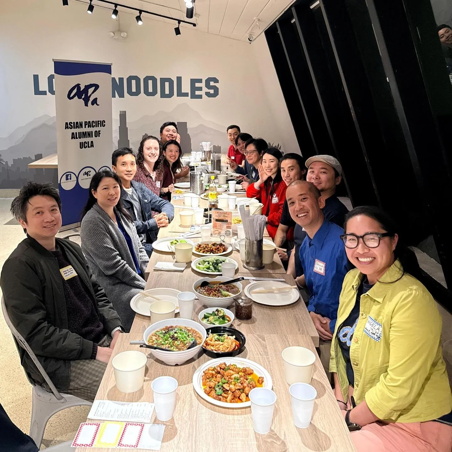 A photo of our APEX board and partner enjoying good food and company.