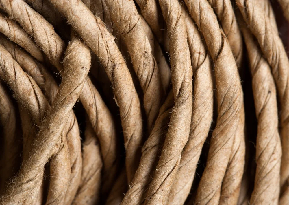 Woven natural fibres representing connection and individual strands