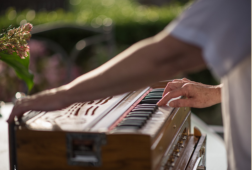 Harmonium being played during Kirtan at Avalokita Yoga