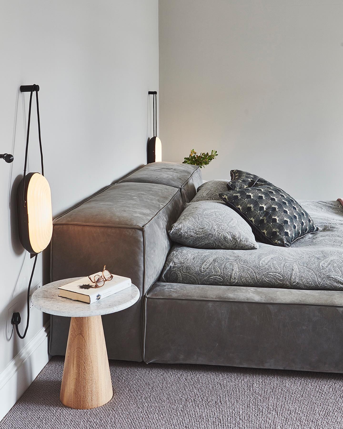 Completing the master bedroom with minimal and stylish furnishings to maximise space.

Interior design: @colour_interiors_ltd.
Architect: @adearchitecture 
Contractor: @mascotbespoke 
Bed: @livingdivani 
Lighting: @le_klint_lighting 
Tables: @theconr